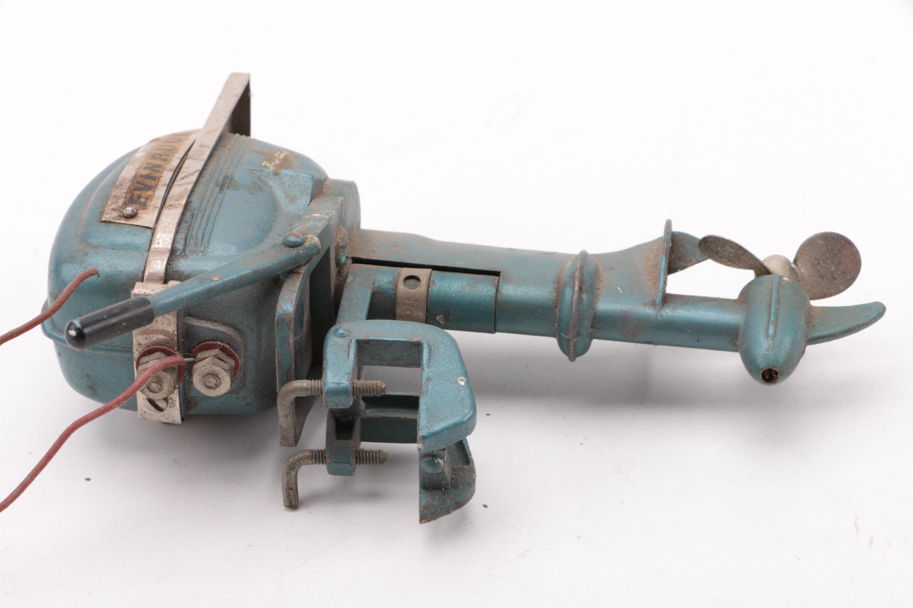 Windup Toy Boat and Vintage Miniature Evinrude Big Twin Outboard Motor