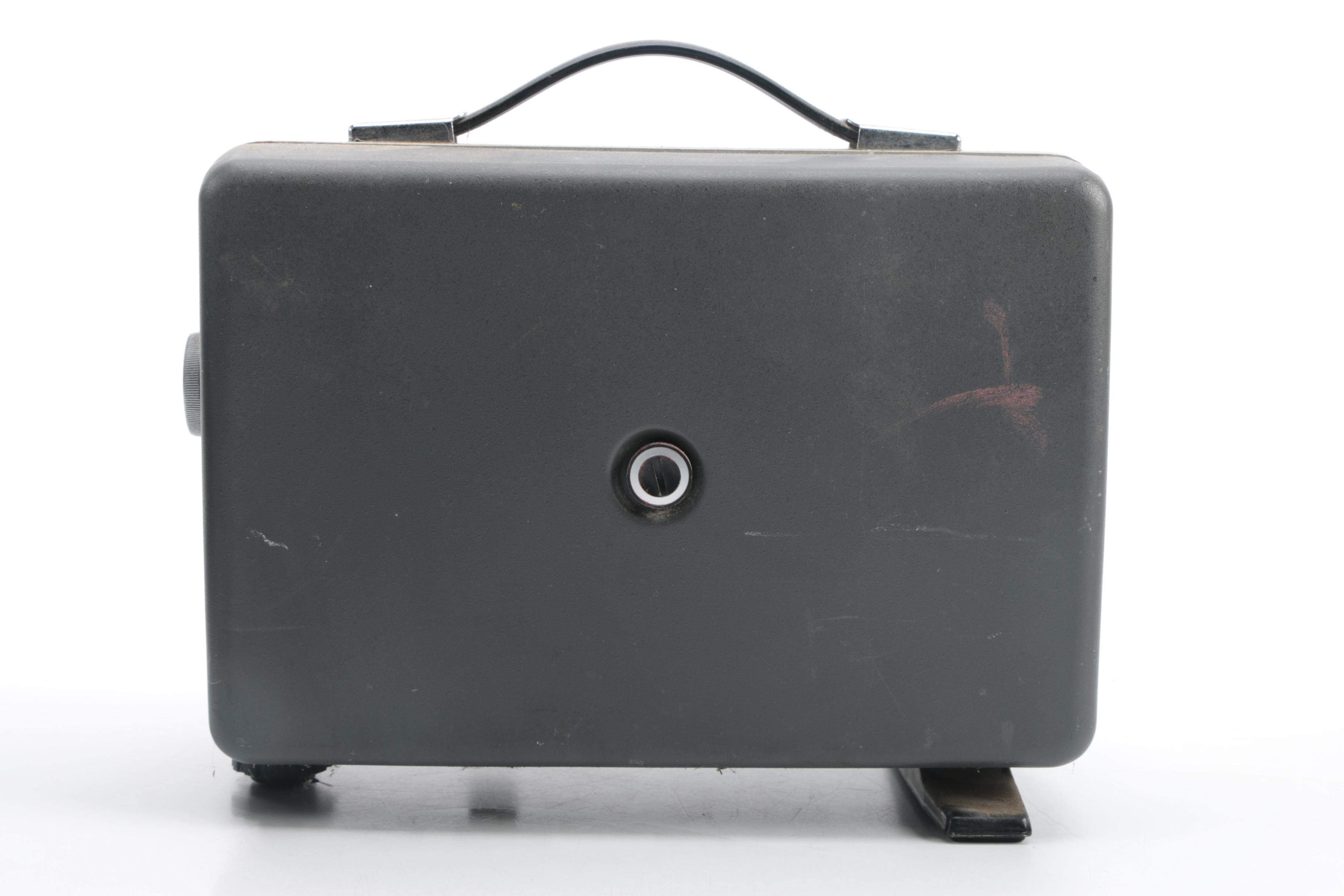 Vintage Cavalier Dual Eight Film Projector and 45 rpm Records