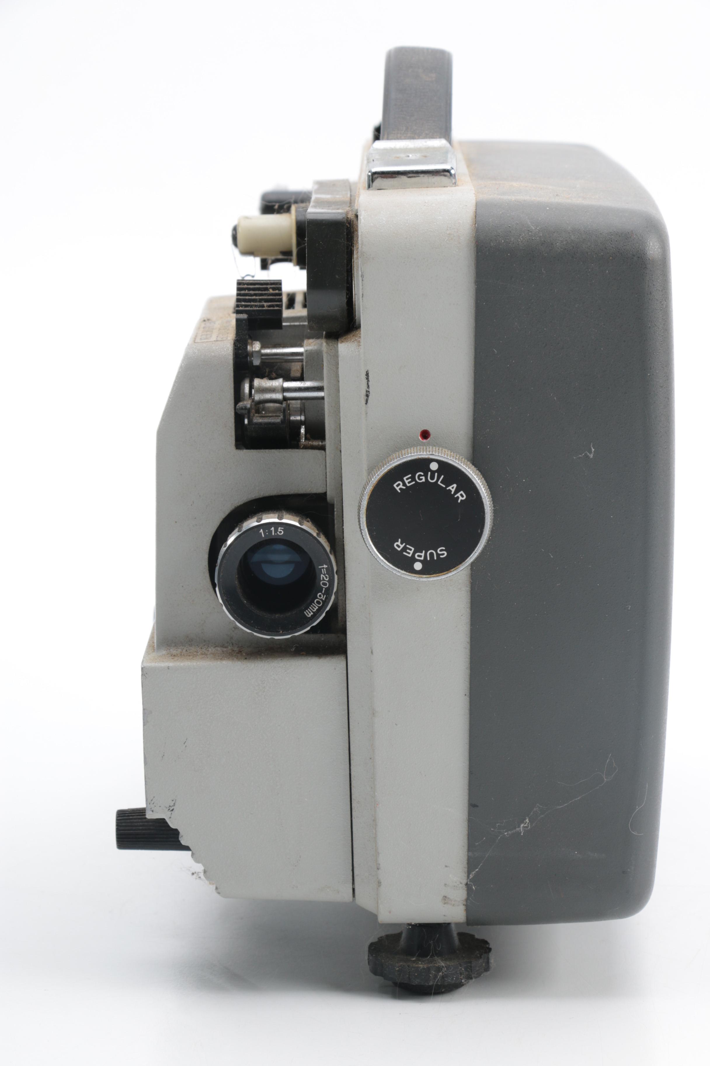 Vintage Cavalier Dual Eight Film Projector and 45 rpm Records