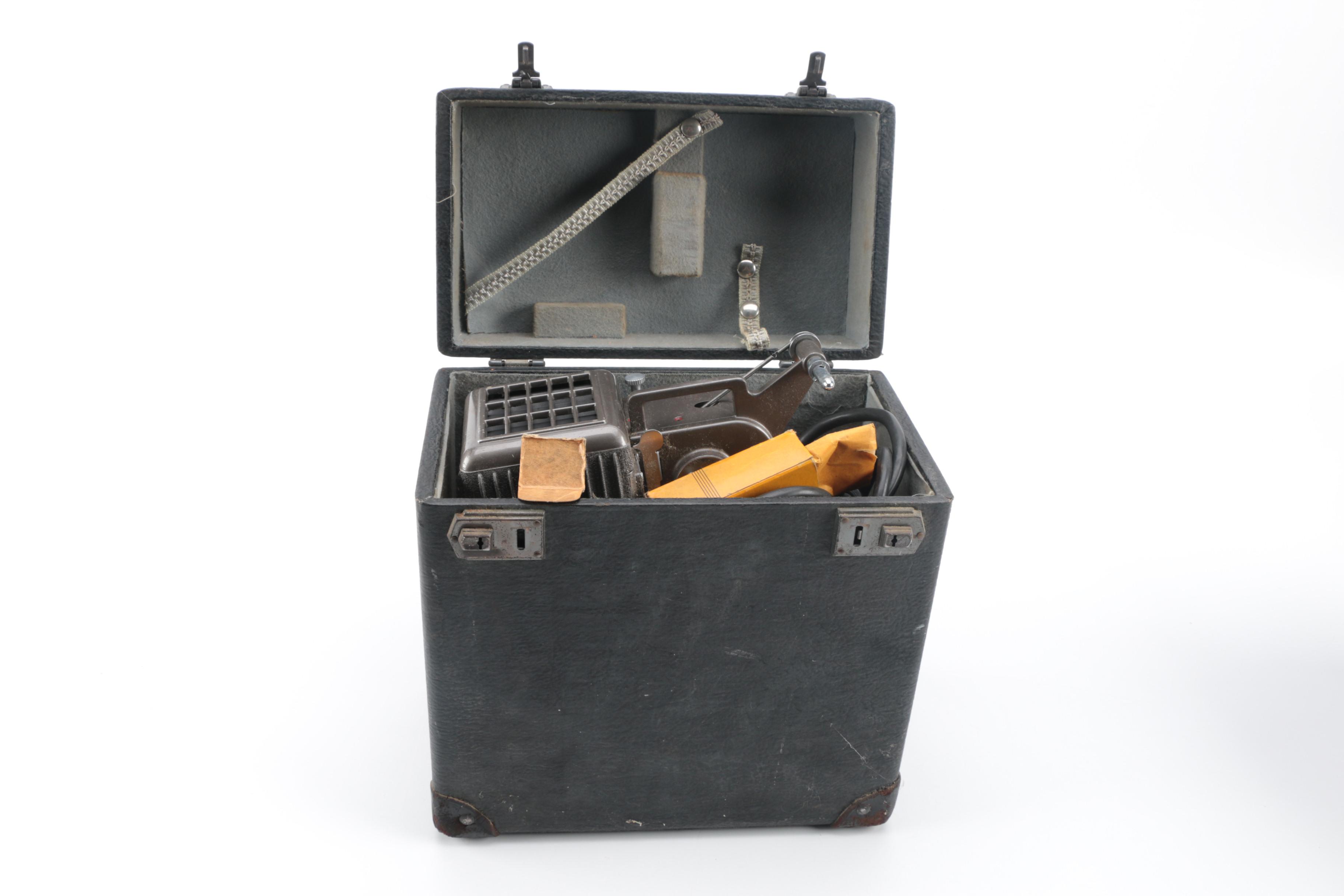 Vintage Cavalier Dual Eight Film Projector and 45 rpm Records