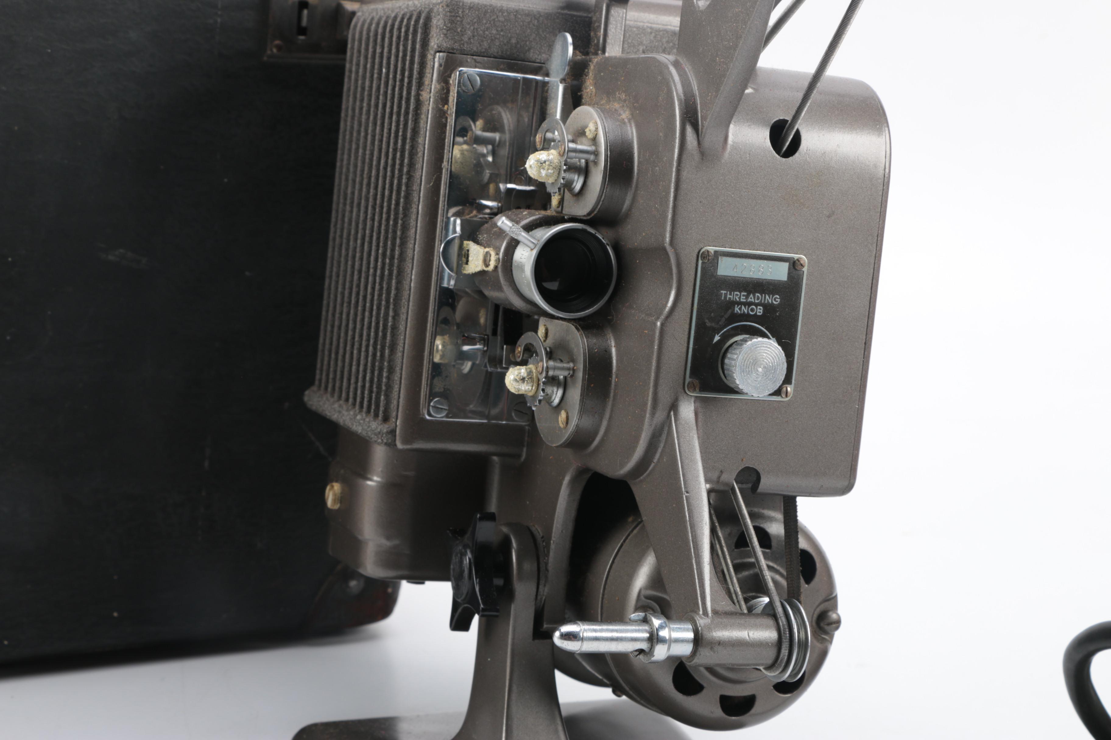 Vintage Cavalier Dual Eight Film Projector and 45 rpm Records