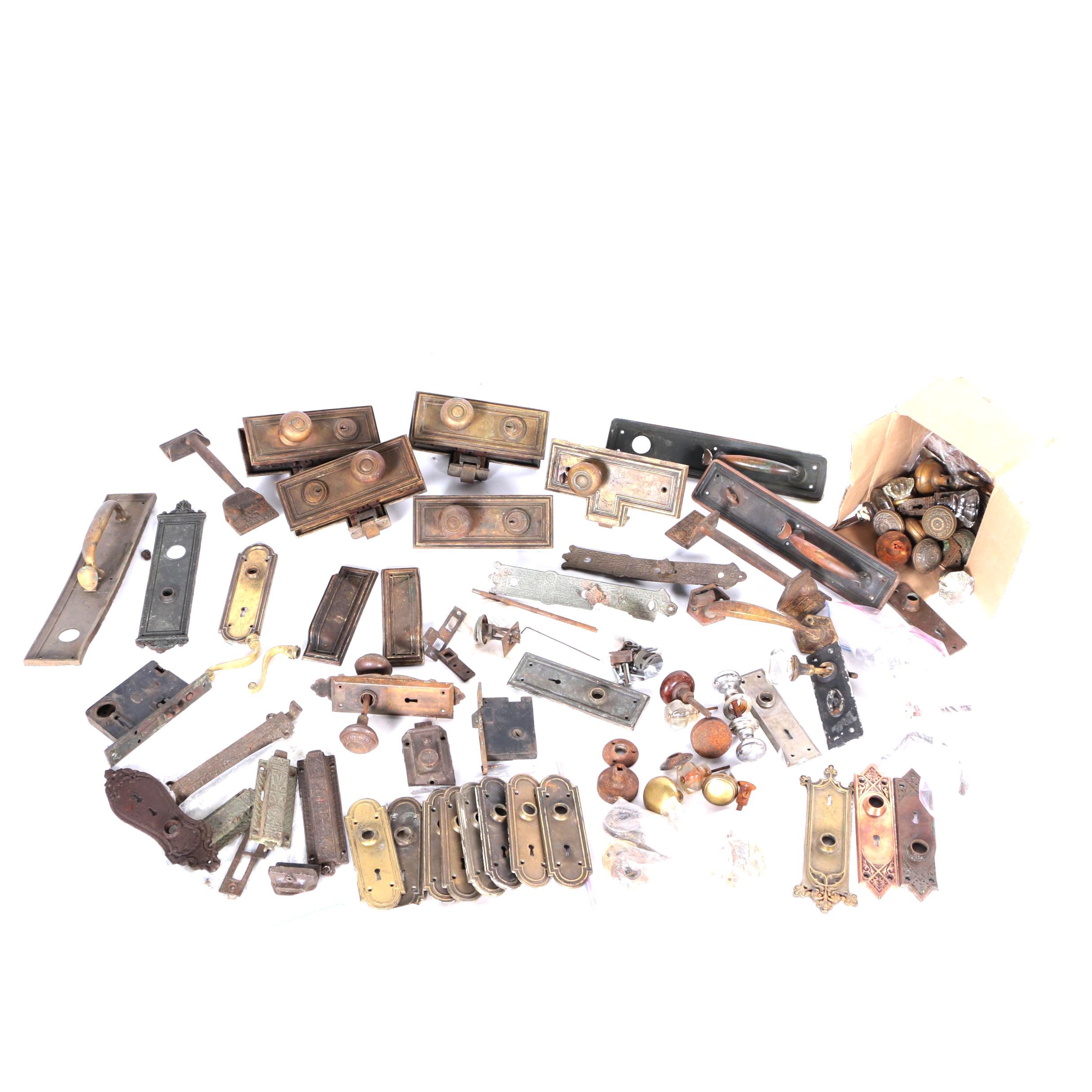 Large Assortment of Door Knobs and Plates