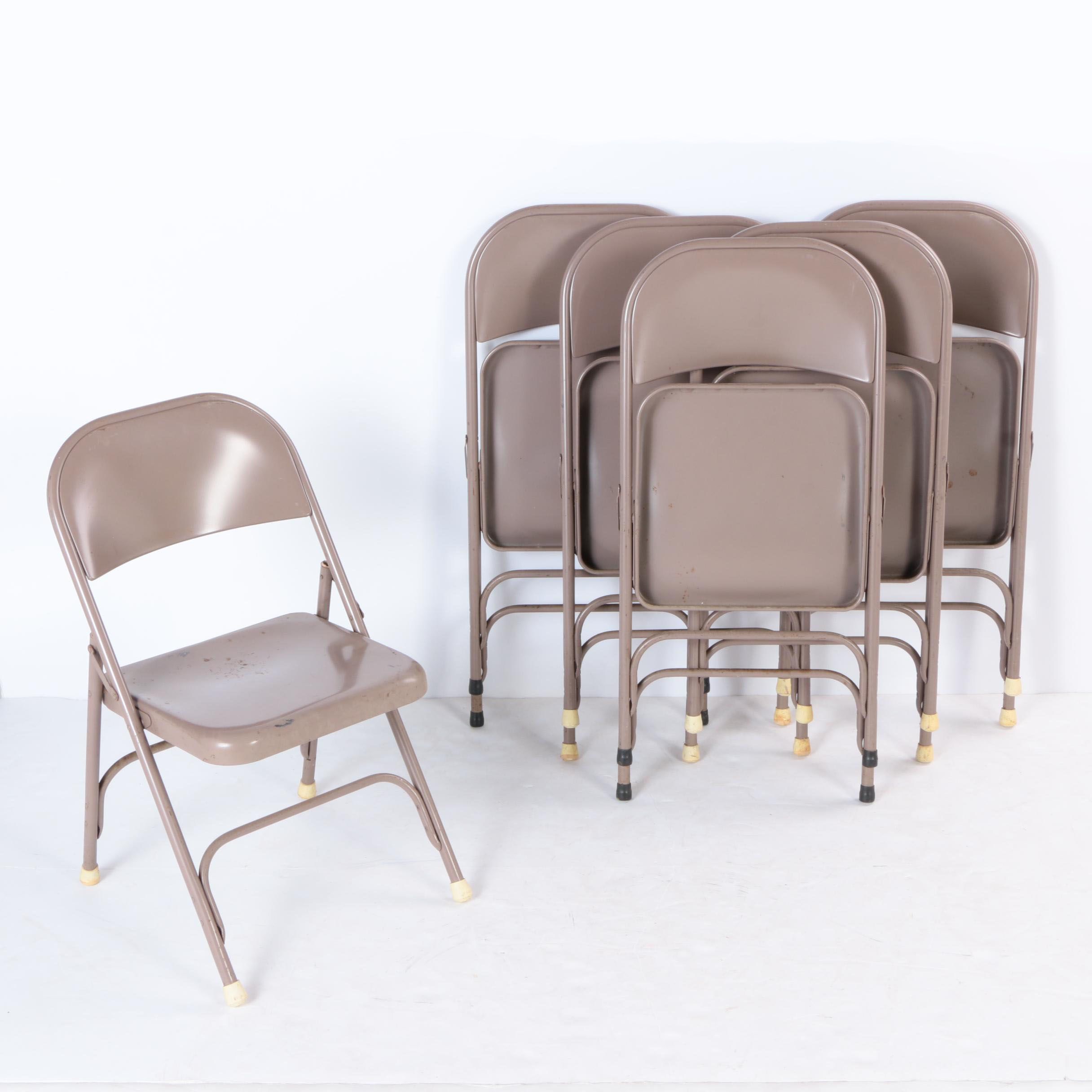 Six Metal Folding Chairs
