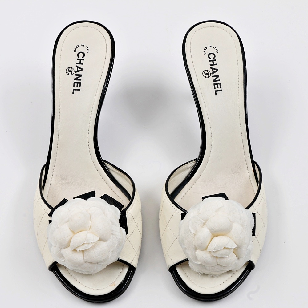 "Chanel" Blanc et Noir Quilted Mules with Rosettes
