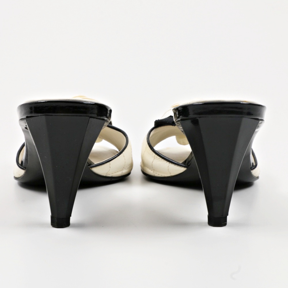 "Chanel" Blanc et Noir Quilted Mules with Rosettes