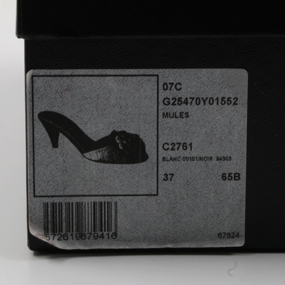 "Chanel" Blanc et Noir Quilted Mules with Rosettes