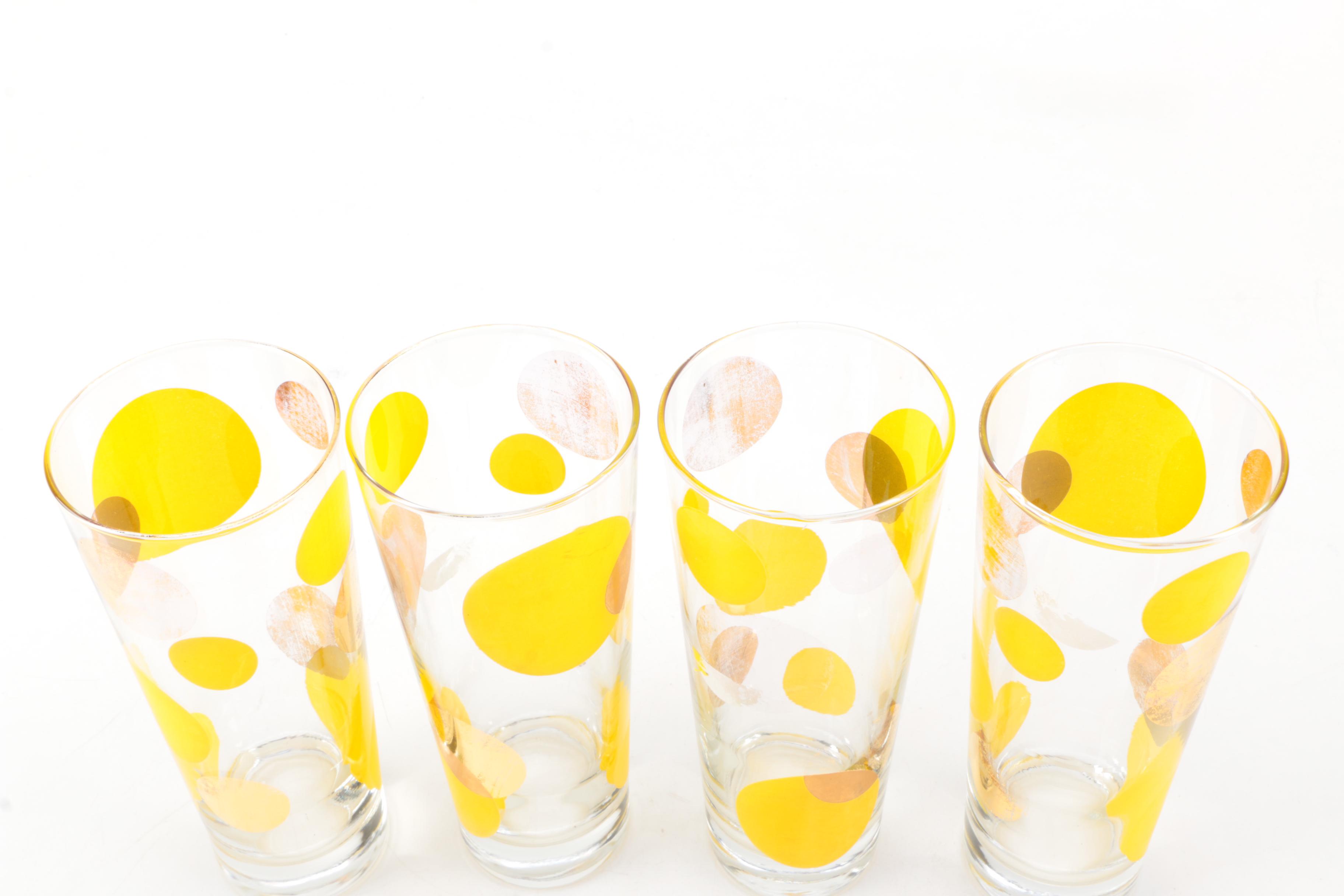 Four Mid Century Modern Drinking Glasses with Yellow Circle Motif