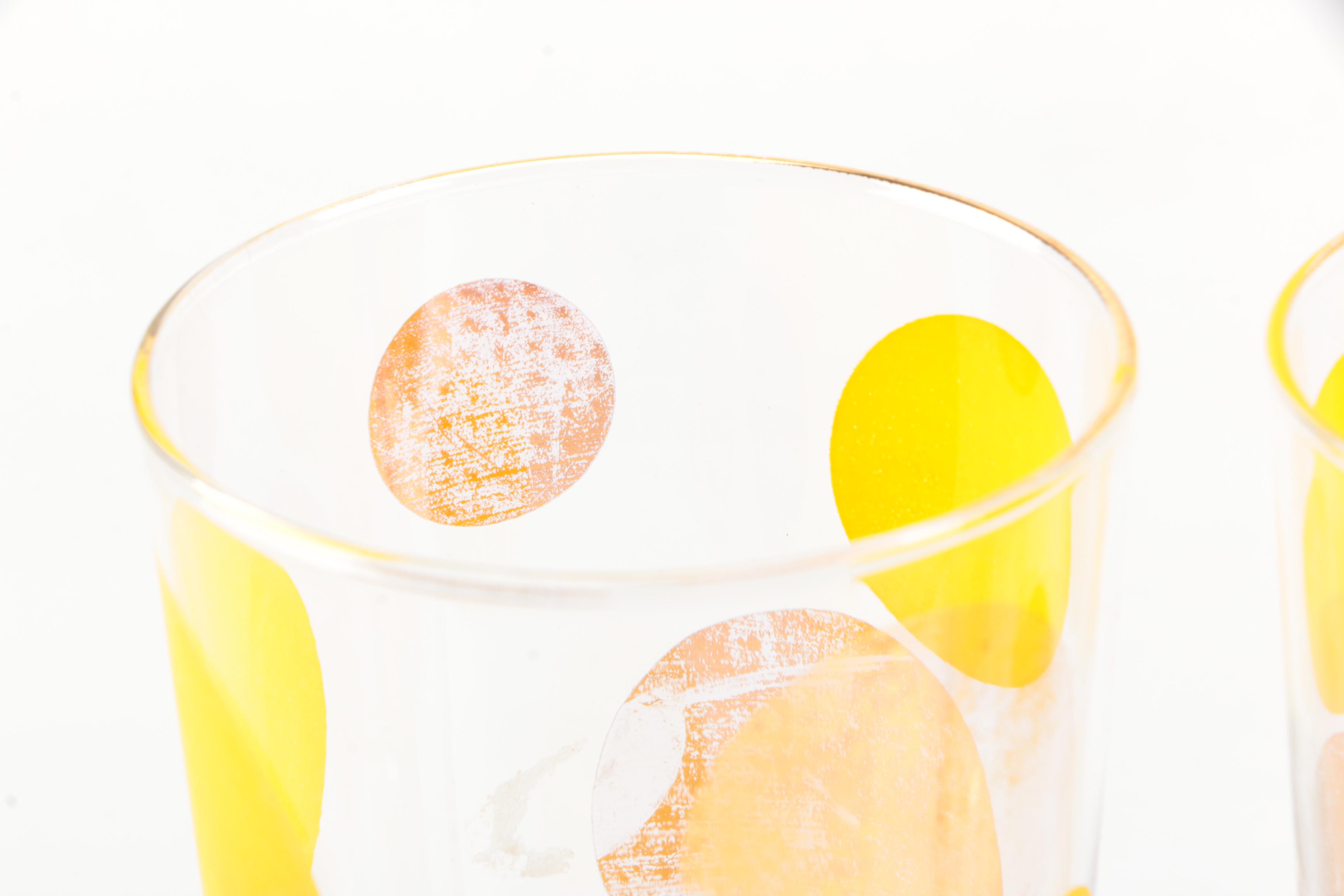 Four Mid Century Modern Drinking Glasses with Yellow Circle Motif