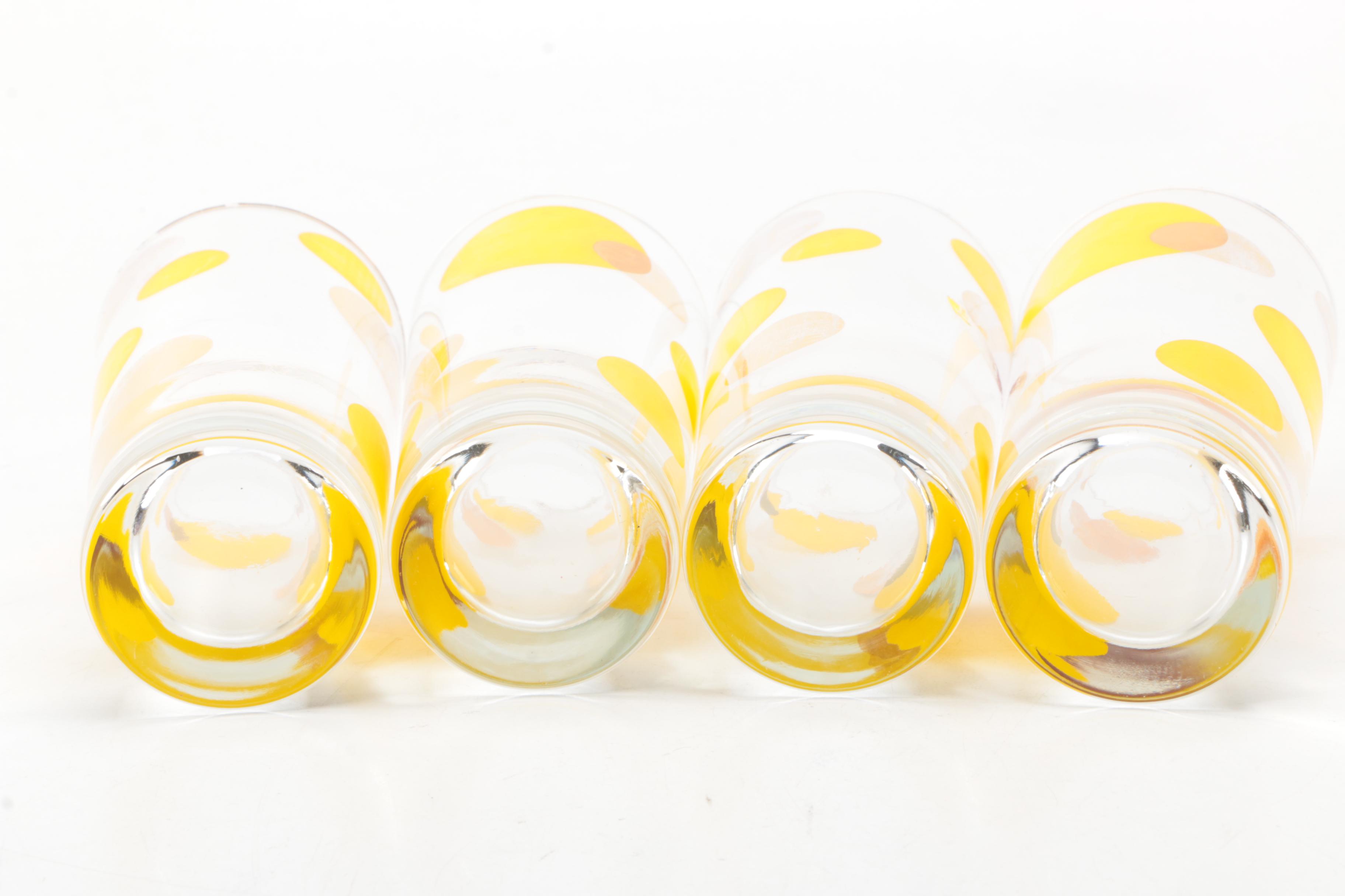 Four Mid Century Modern Drinking Glasses with Yellow Circle Motif