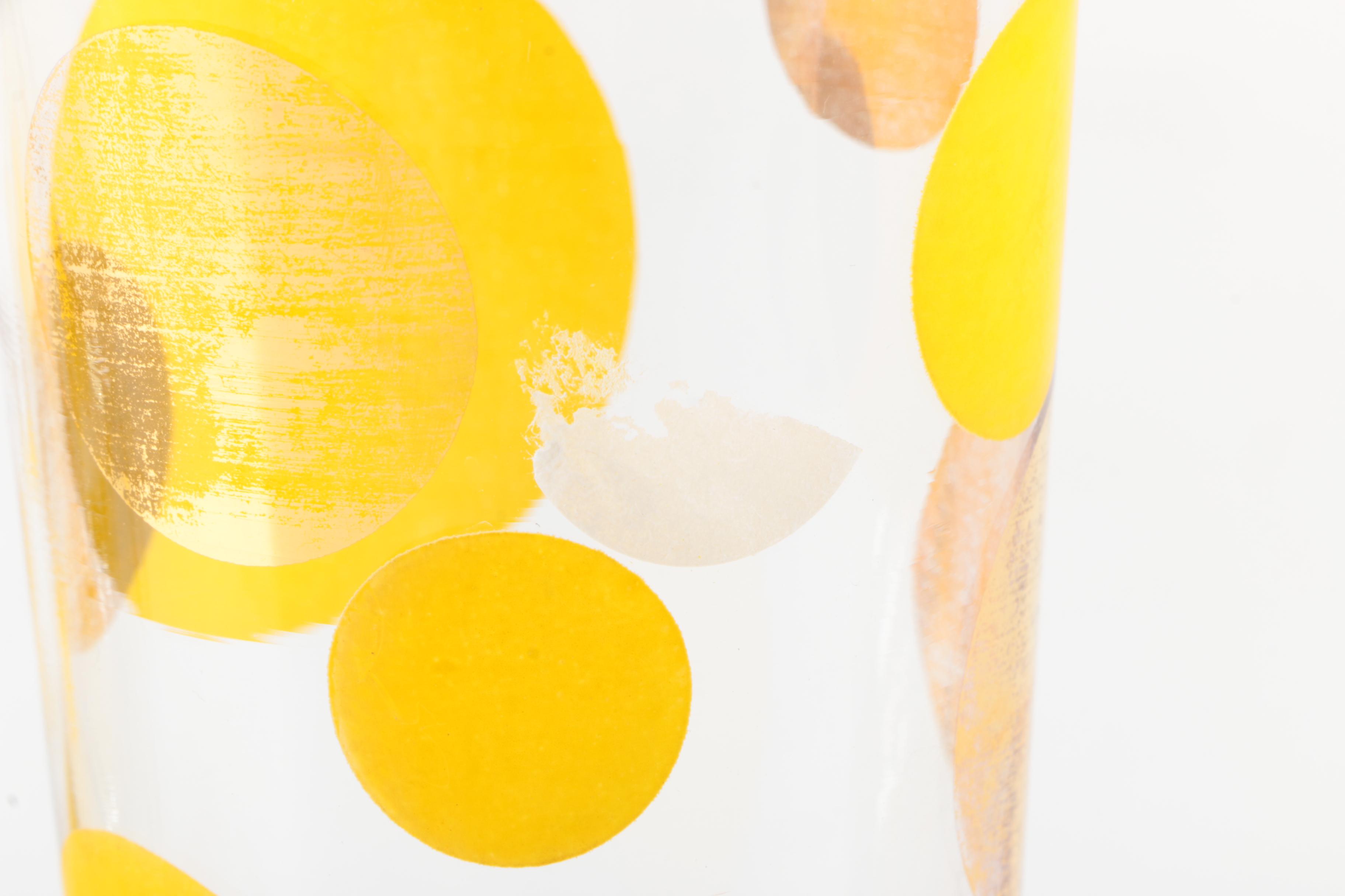 Four Mid Century Modern Drinking Glasses with Yellow Circle Motif