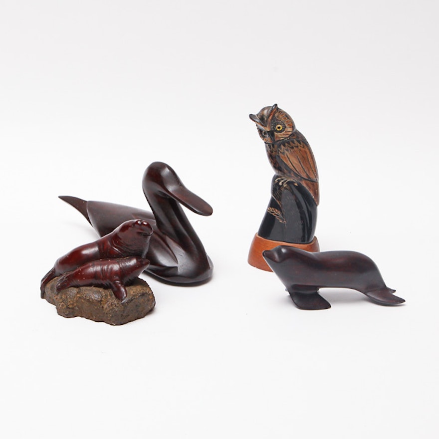 Collection of Four Hand Carved Wooden Animal Figurines