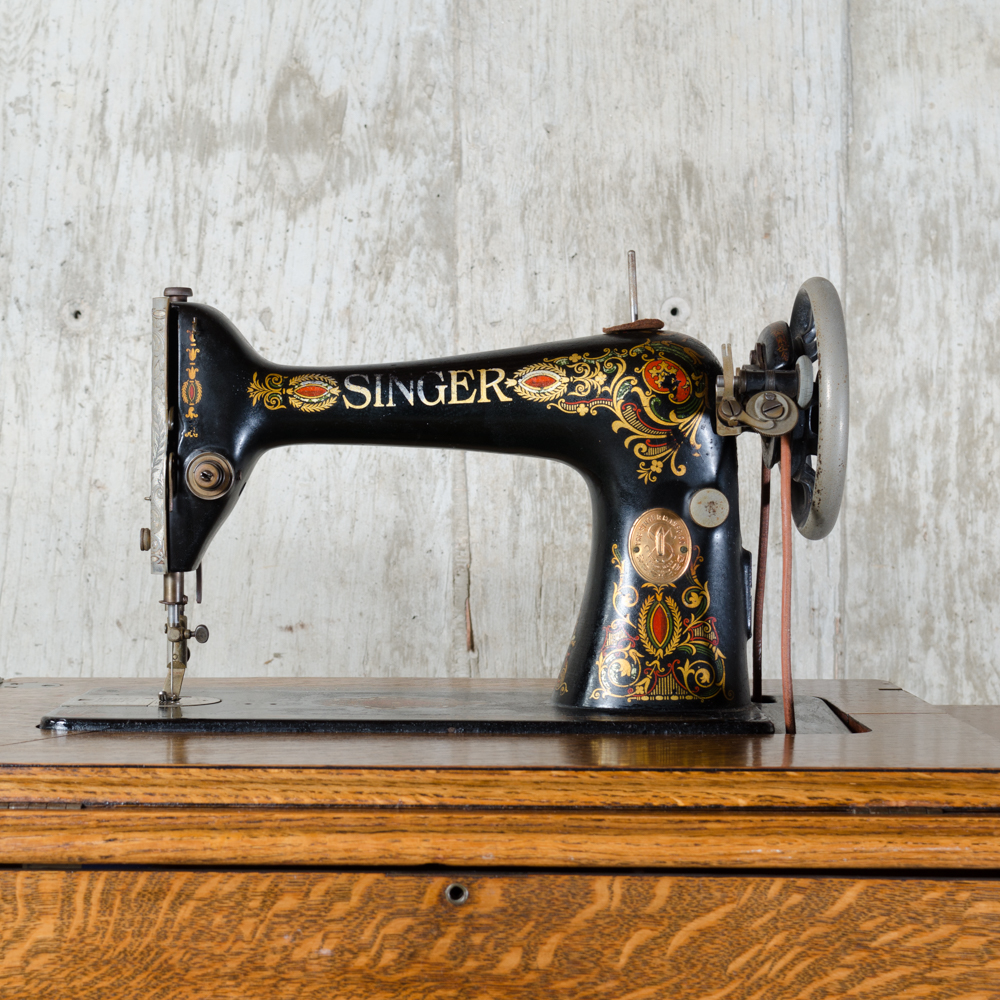 Antique Singer Sewing Machine and Treadle Table