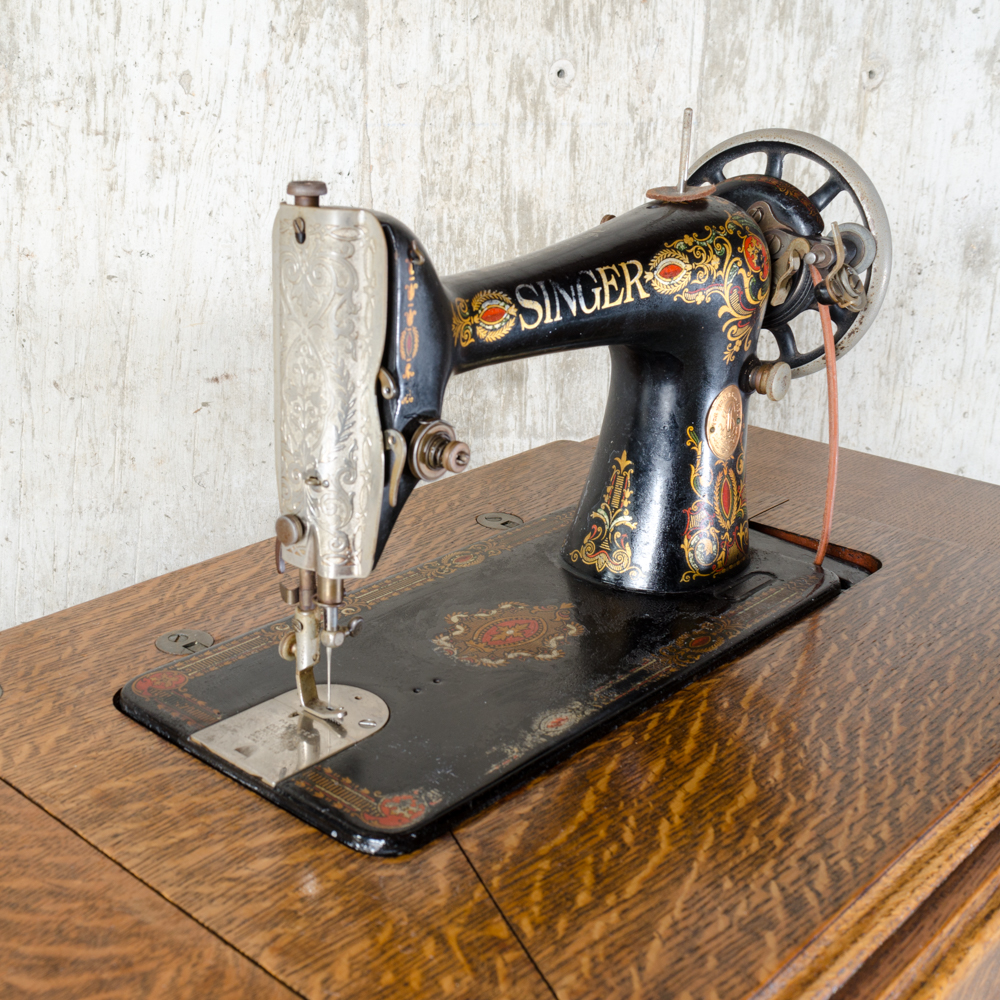 Antique Singer Sewing Machine and Treadle Table