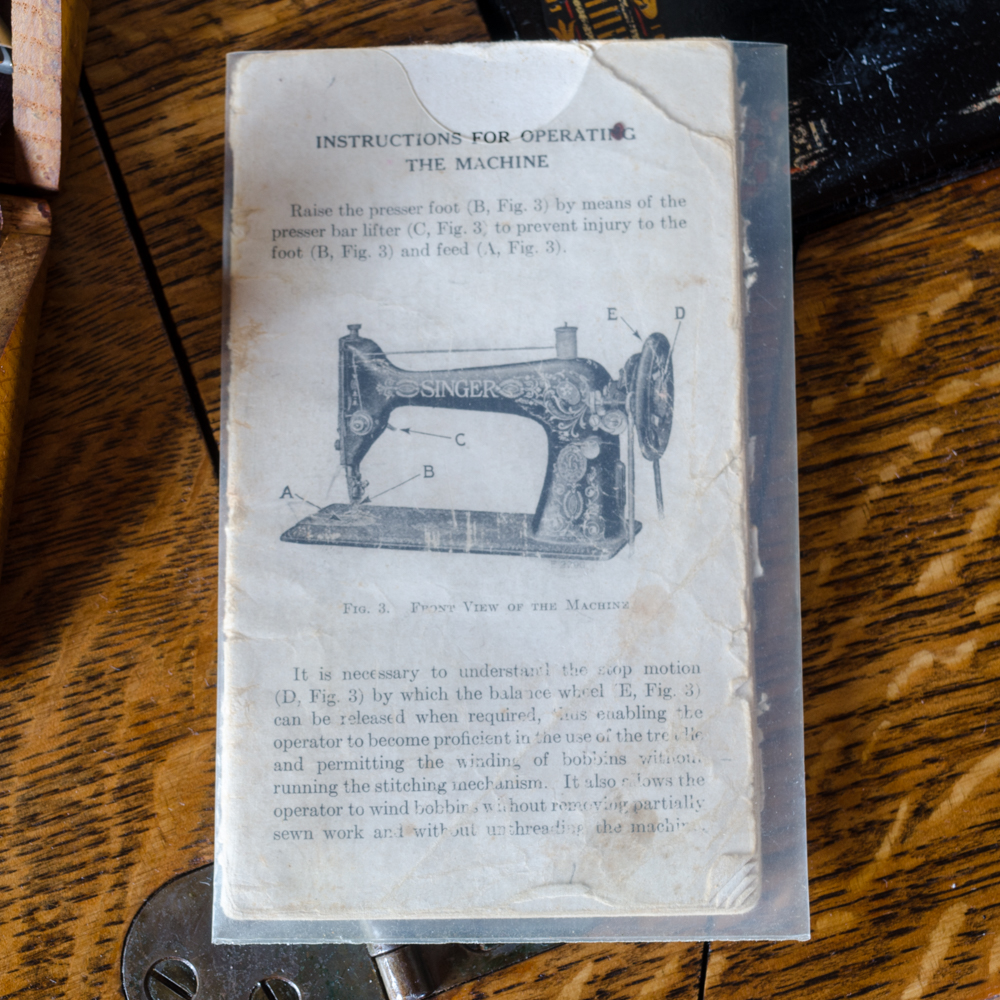 Antique Singer Sewing Machine and Treadle Table