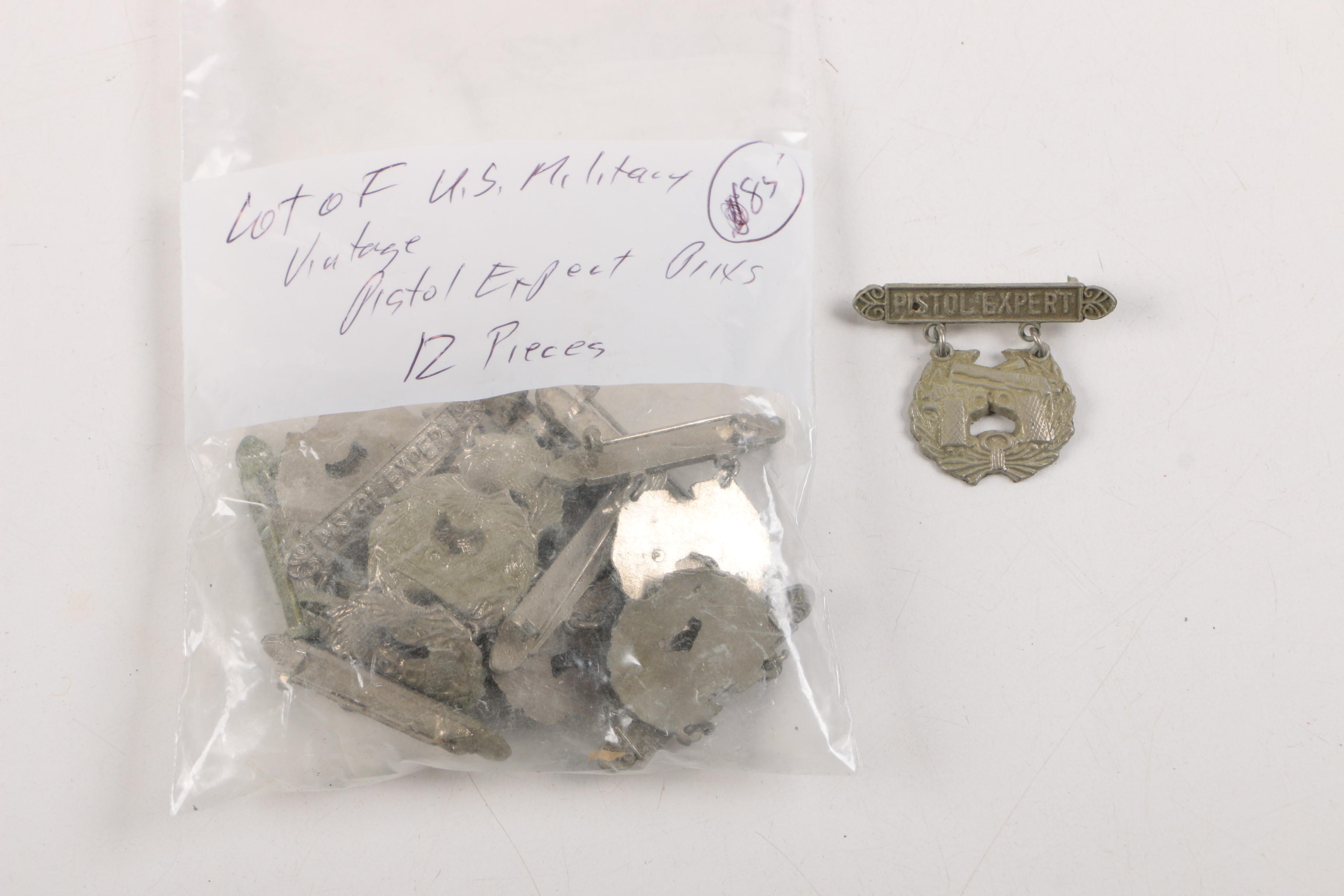 Collection of Metal US Military Marksman Qualification Badges