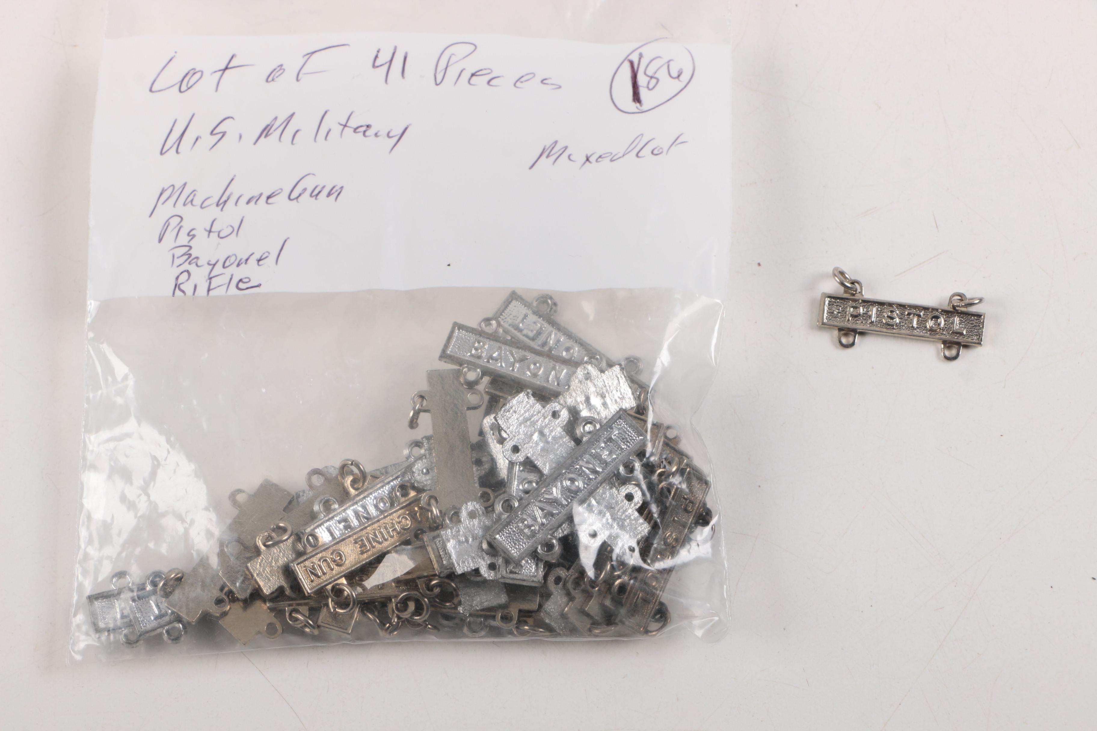 Collection of Metal US Military Marksman Qualification Badges