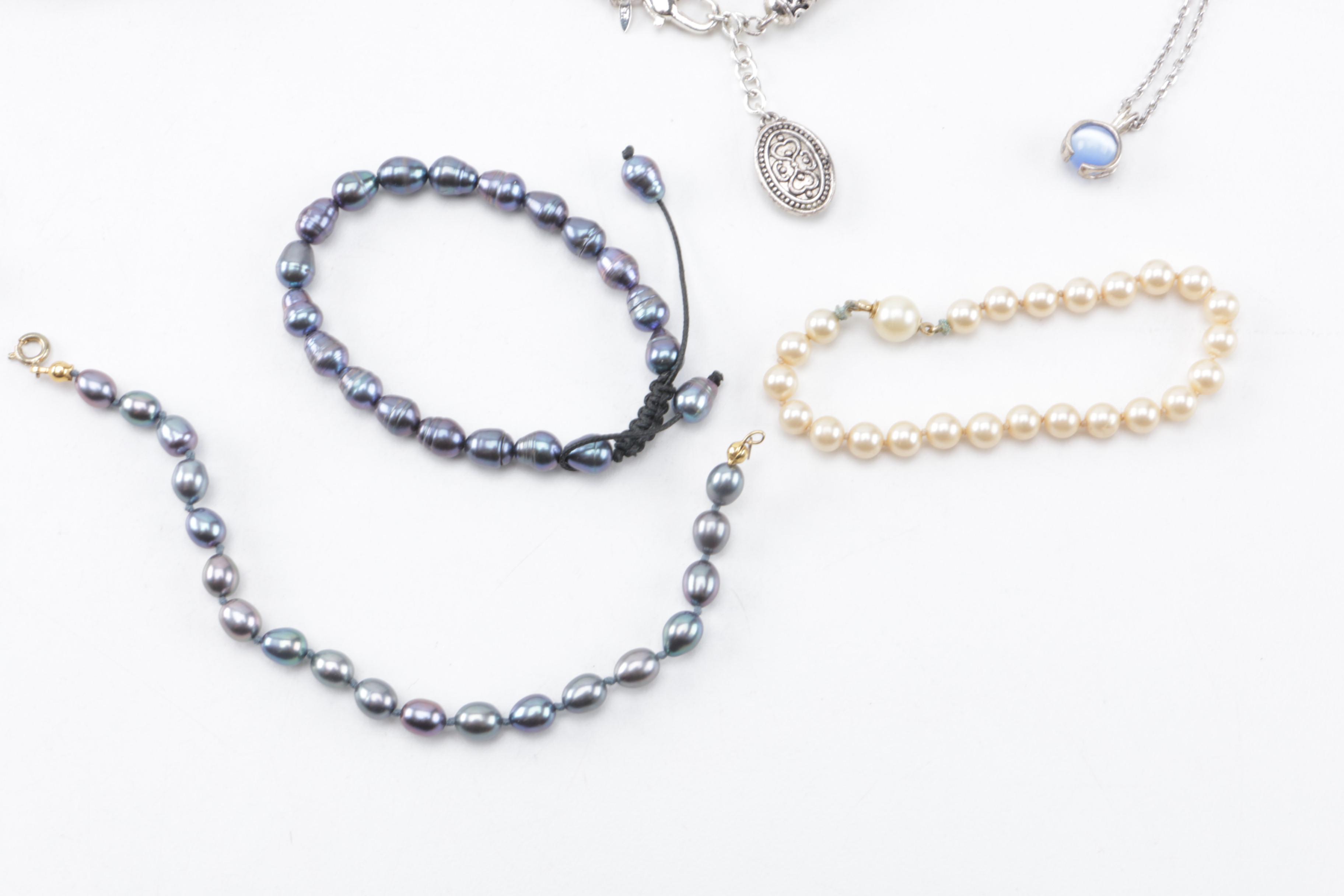 Assortment of Costume Jewelry Including Chanel Buttons