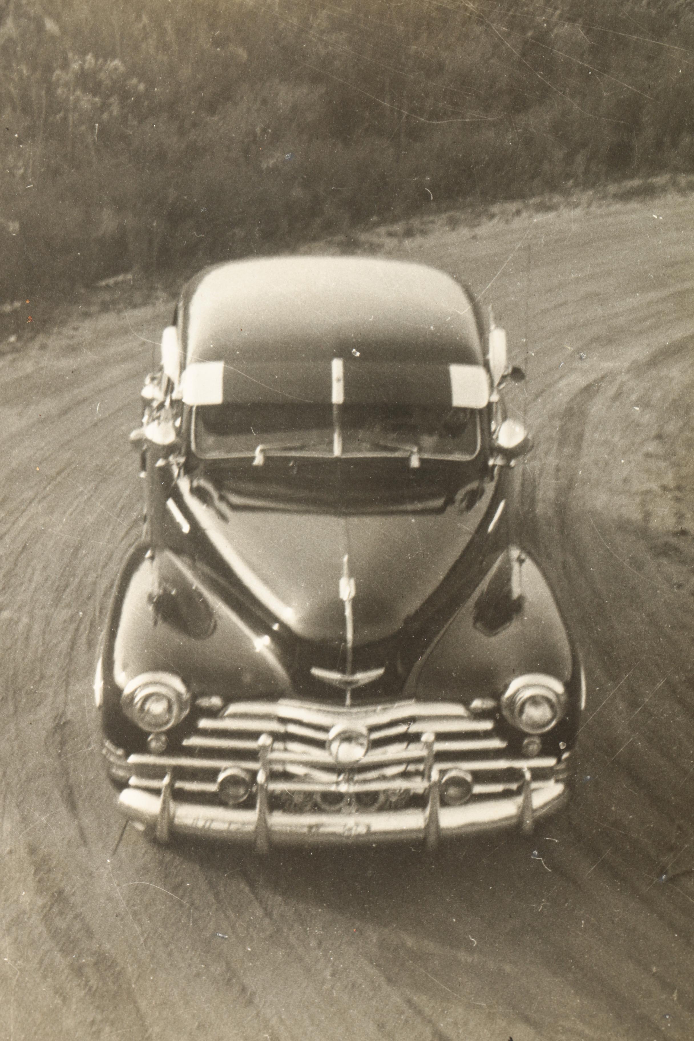 Albumen and Black and White Photographs Featuring Photos of Cars