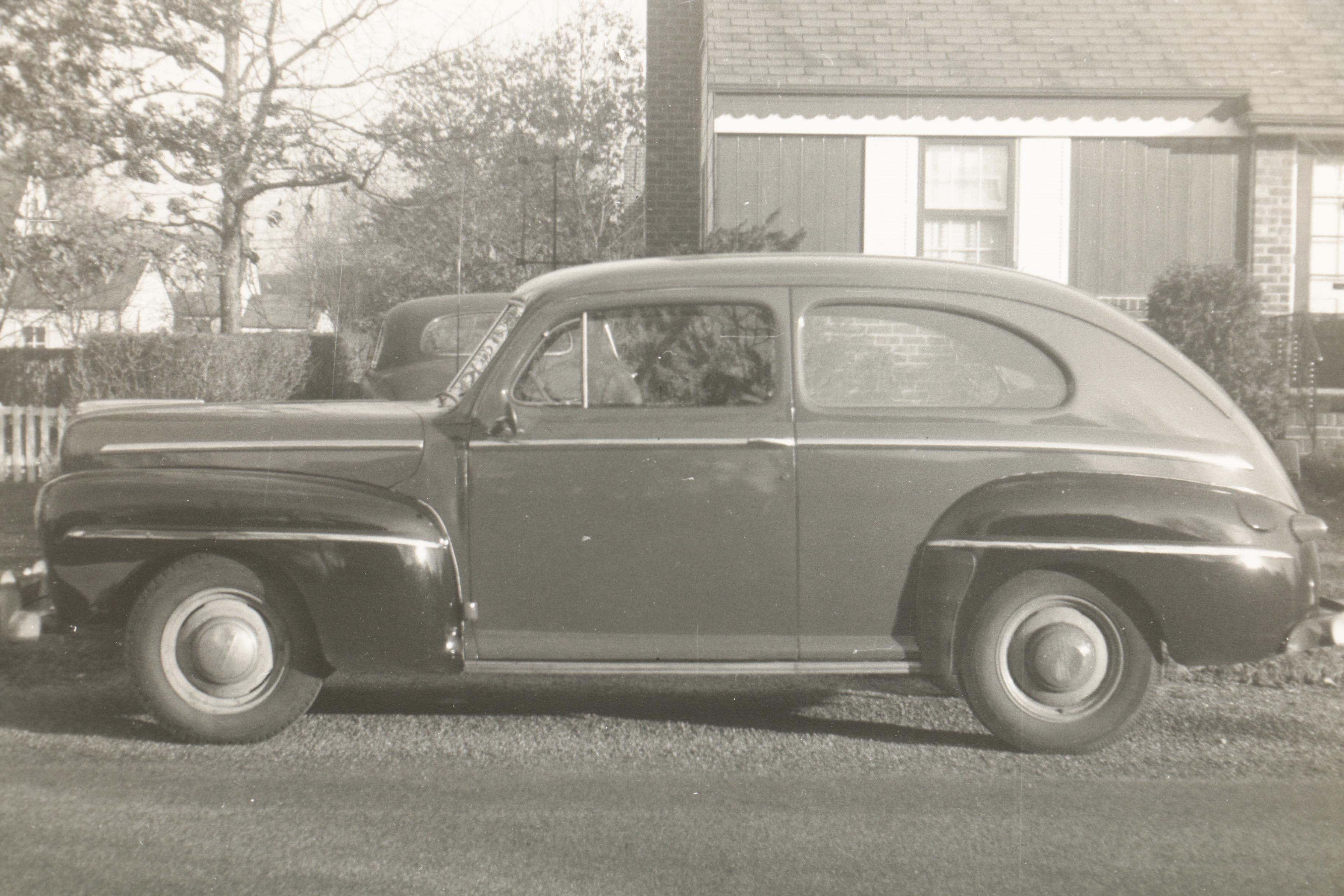 Albumen and Black and White Photographs Featuring Photos of Cars
