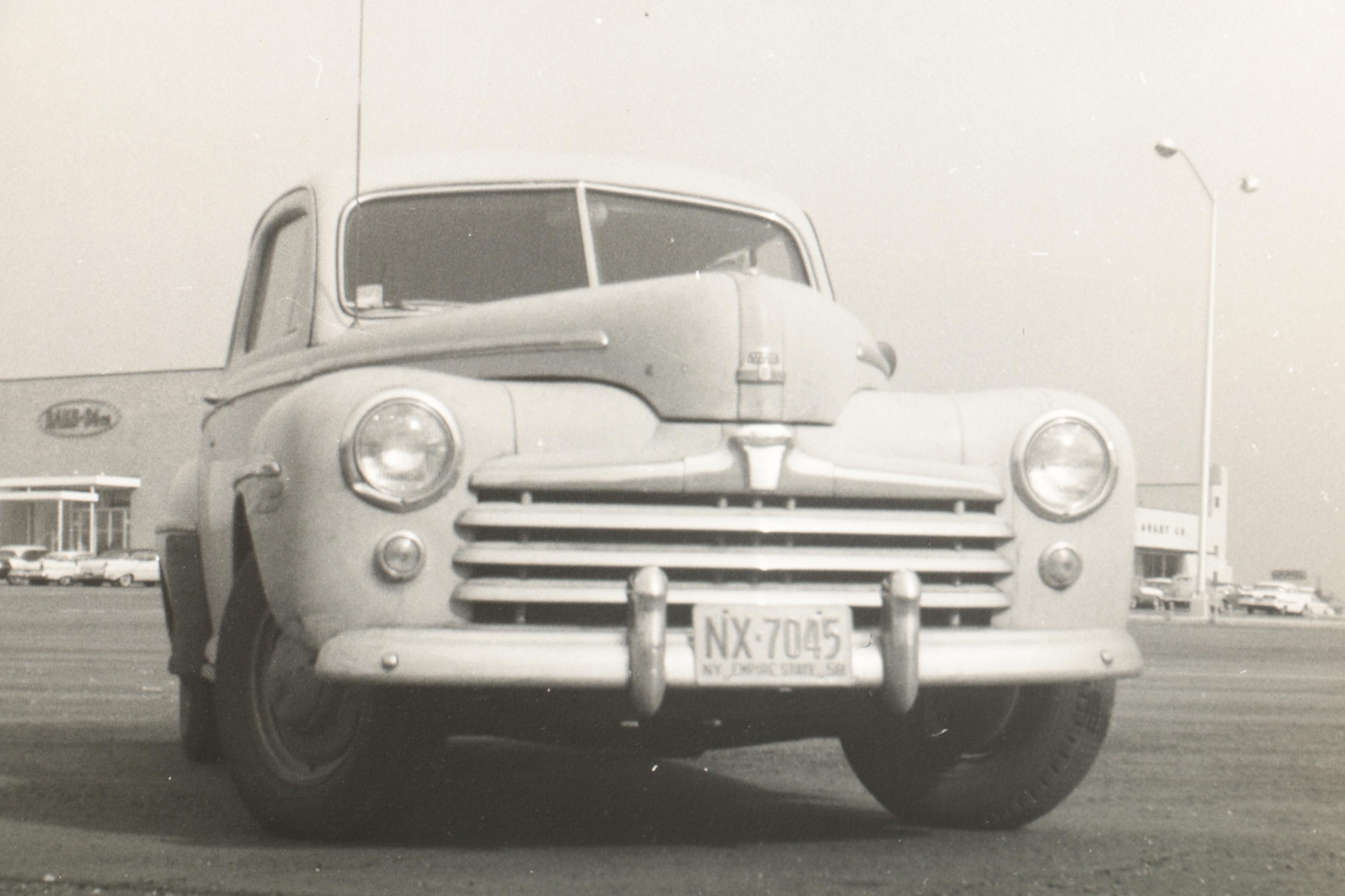 Albumen and Black and White Photographs Featuring Photos of Cars