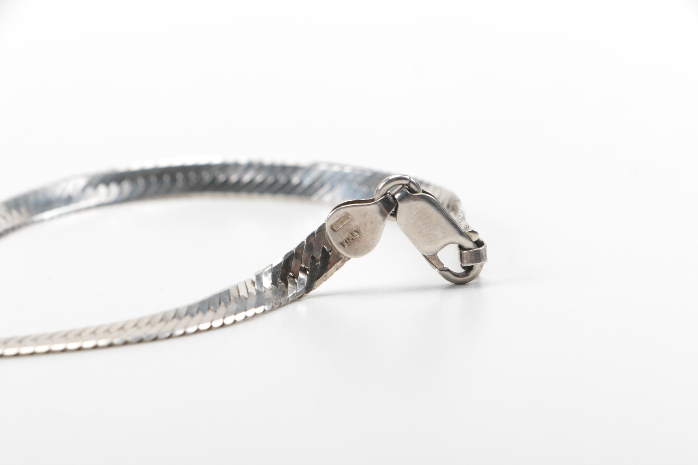 Assortment of Mexican, Italian, and Other Sterling Silver Jewelry