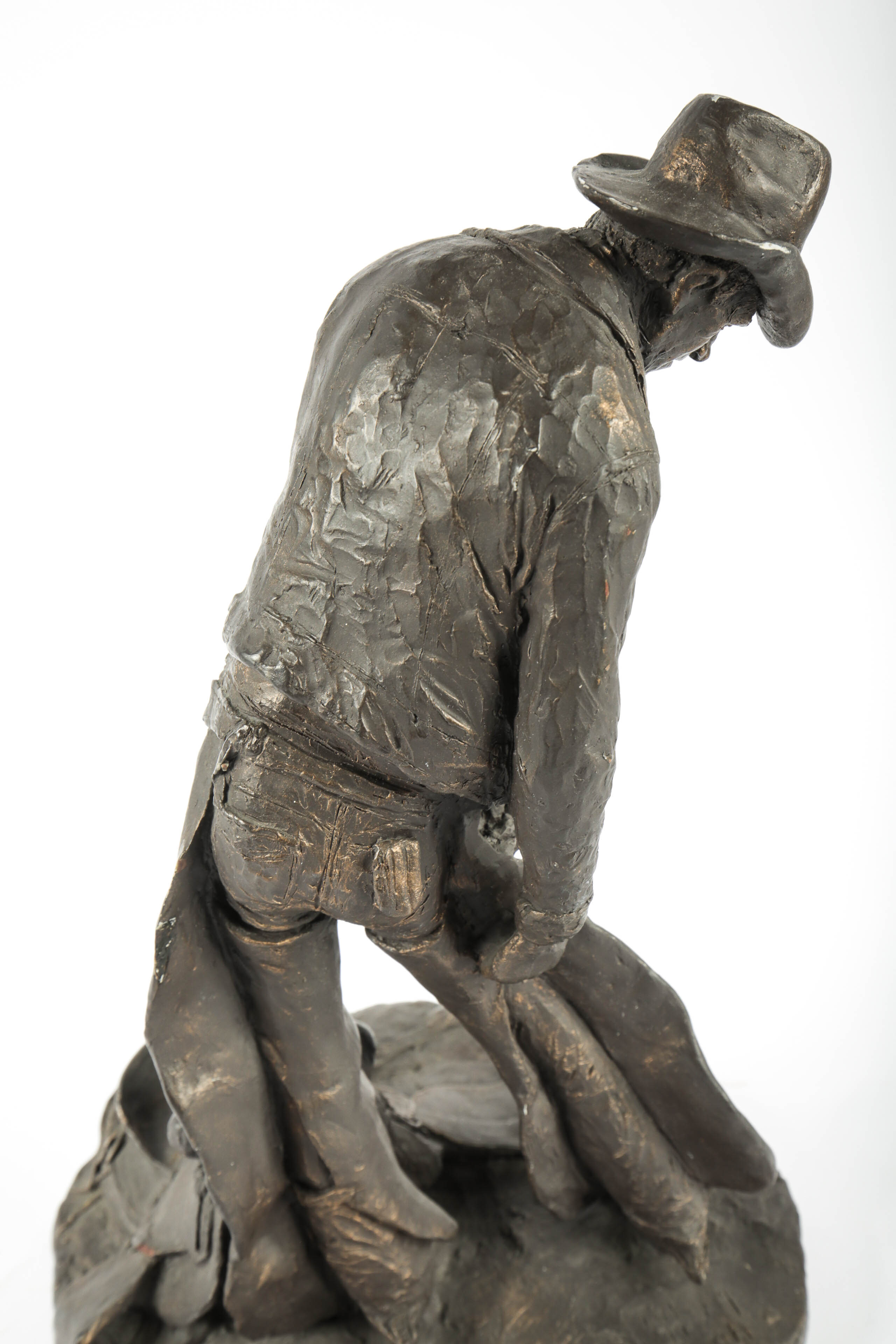Michael Garman "Taking the Rough Off” Metal Cowboy Sculpture