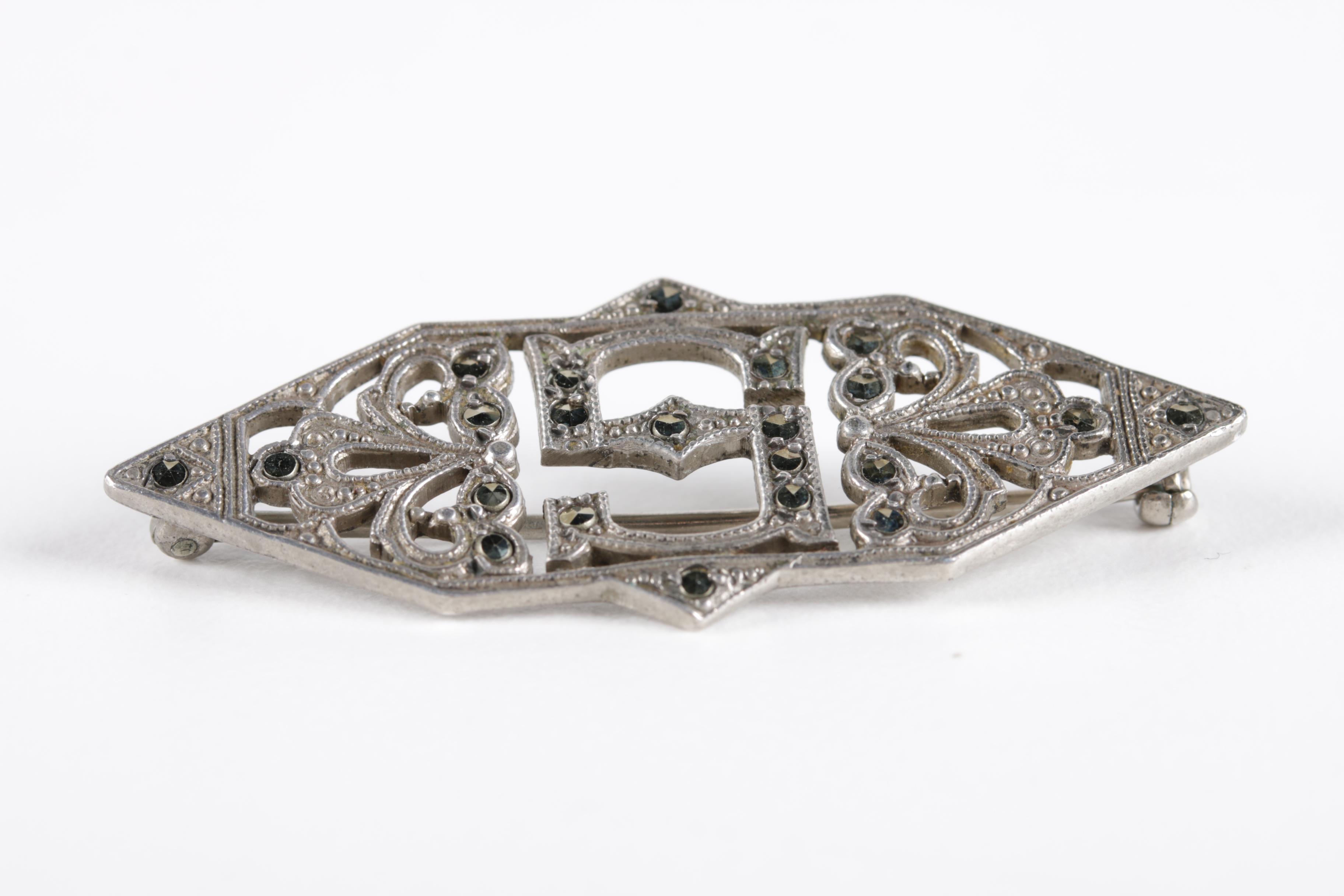 Selection of Sterling Silver Brooches Including Paris Land Mark Bracelet