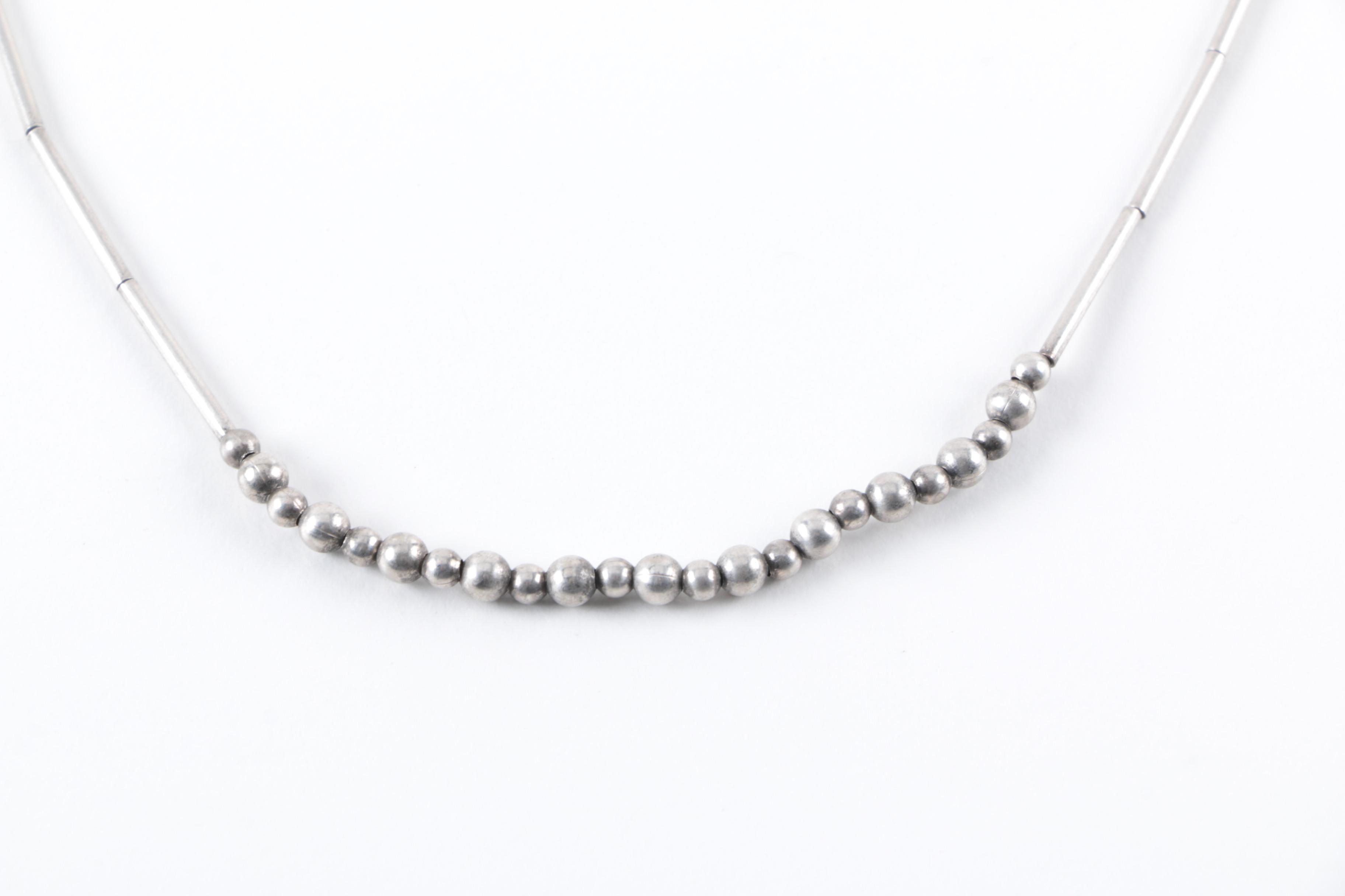 Silver Tone Mesoamerican Warrior Face Bracelets with Assorted Jewelry