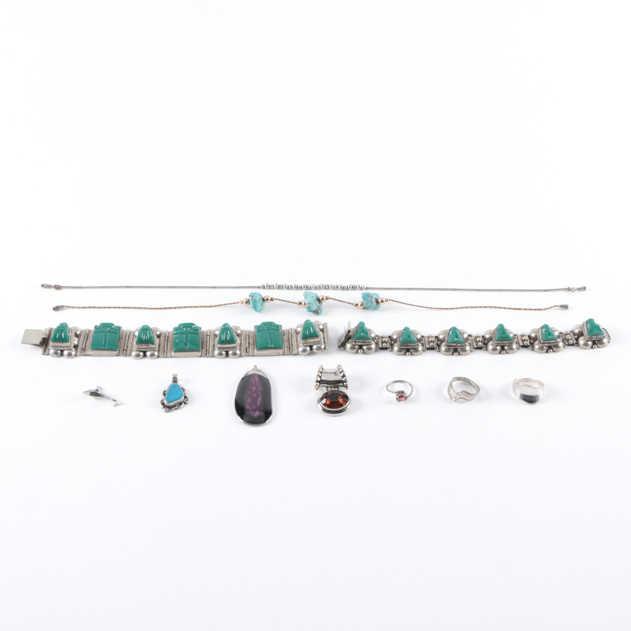 Silver Tone Mesoamerican Warrior Face Bracelets with Assorted Jewelry