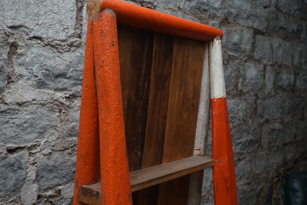 Repurposed Lifeboat Oar Bookshelf