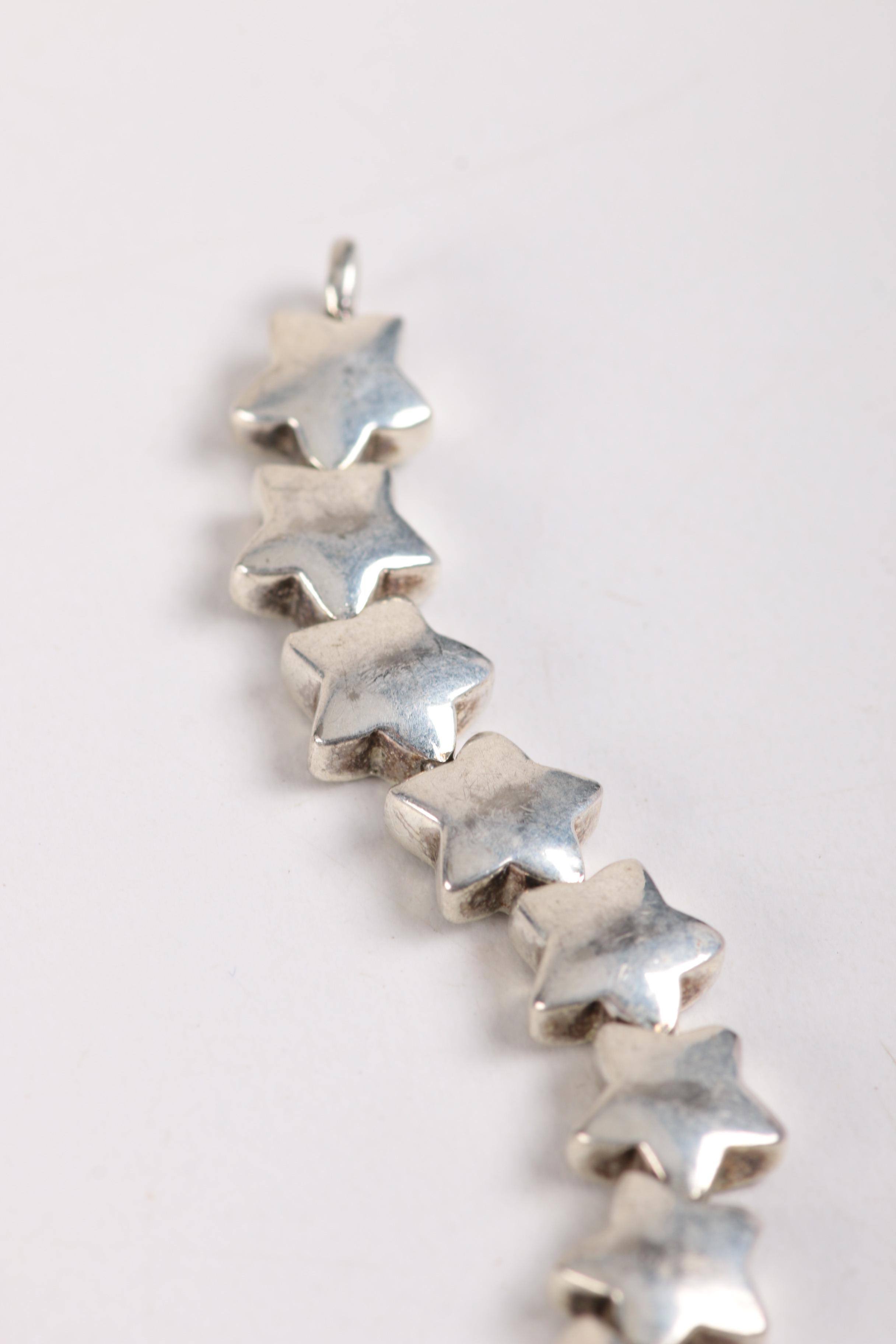 Sterling Silver Jewelry and a Gold Tone Costume Brooch