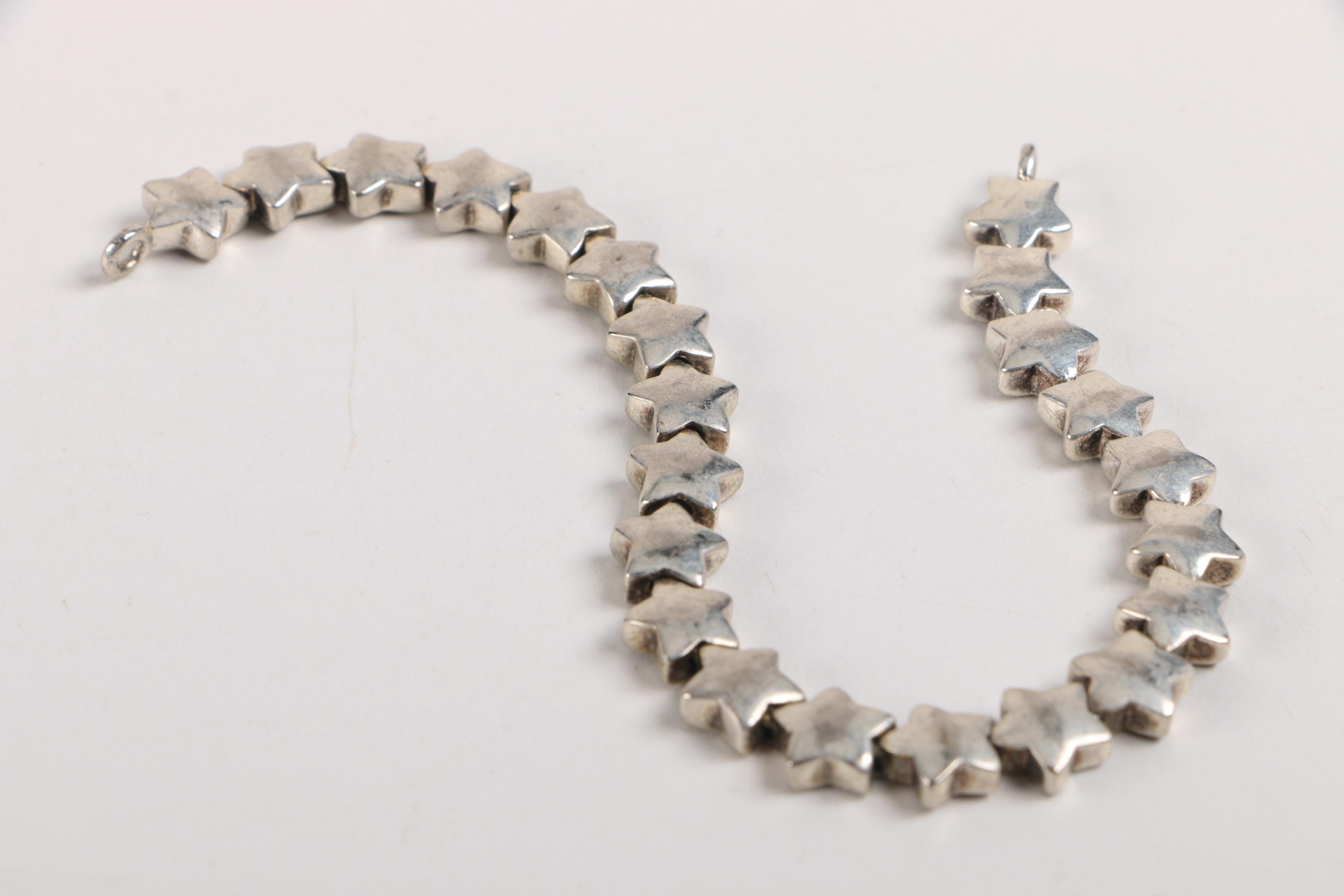 Sterling Silver Jewelry and a Gold Tone Costume Brooch