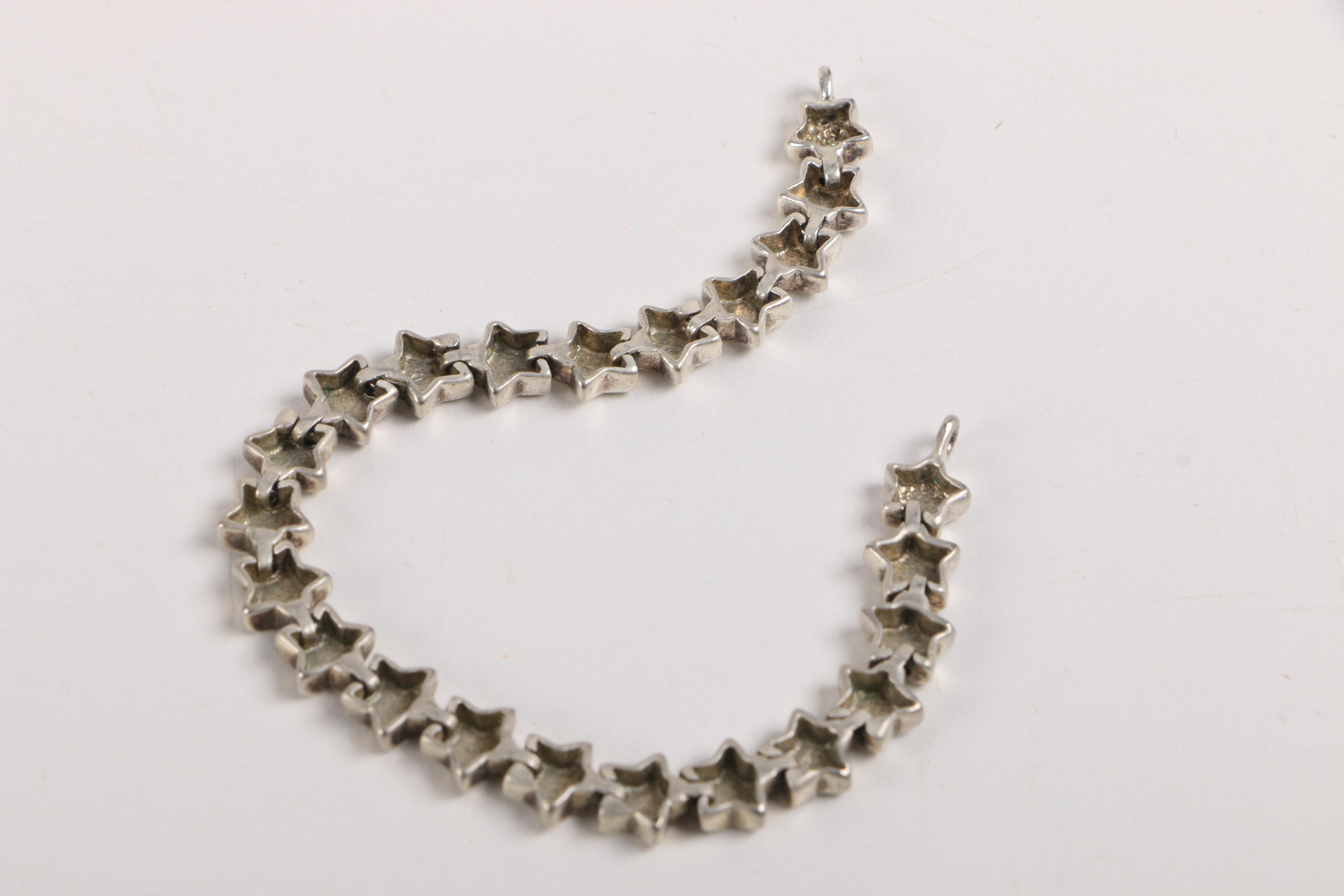 Sterling Silver Jewelry and a Gold Tone Costume Brooch