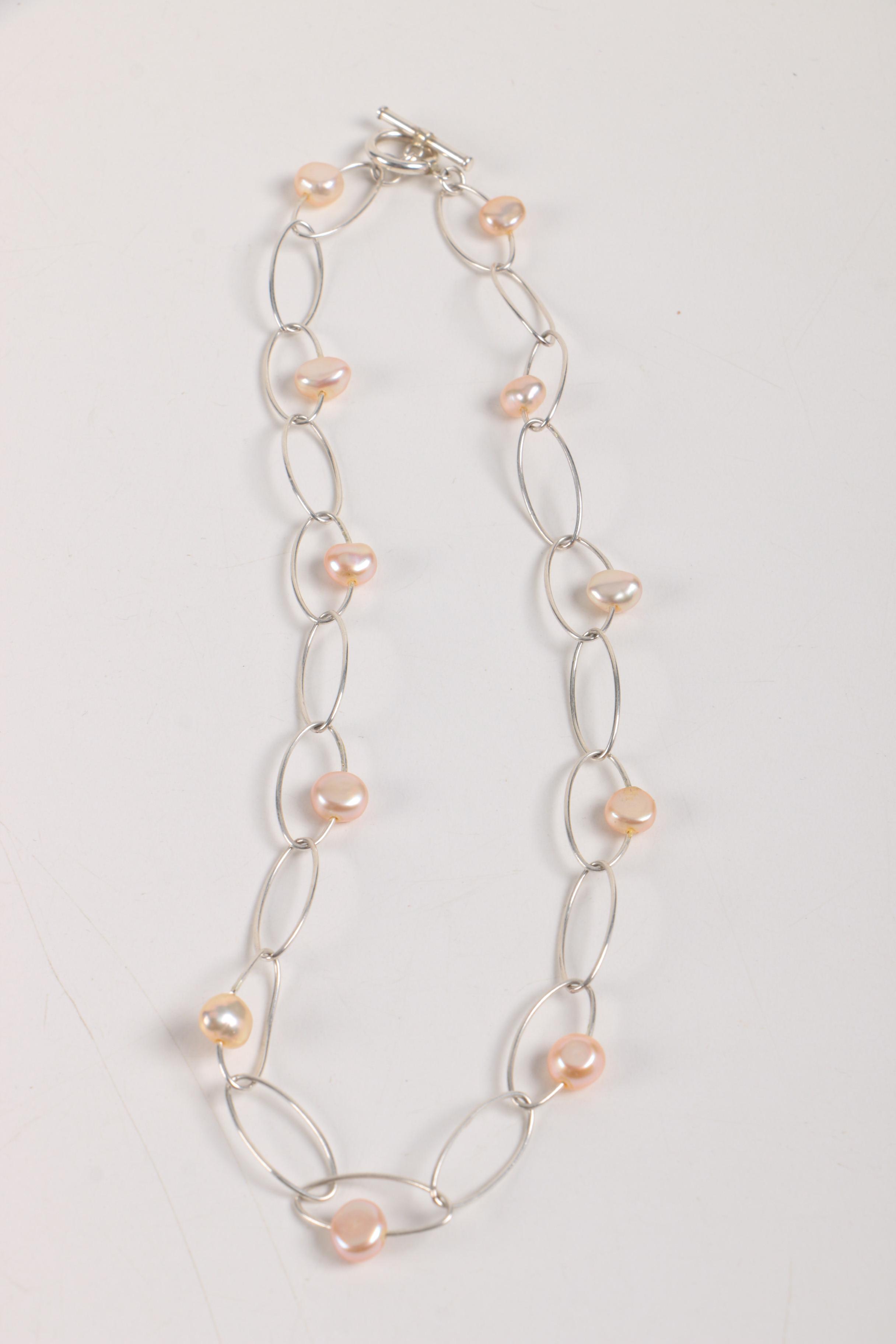 Sterling Silver Jewelry and a Gold Tone Costume Brooch