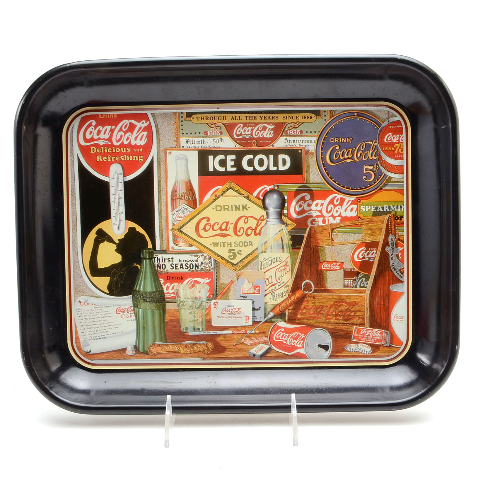 Four Coca-Cola Trays