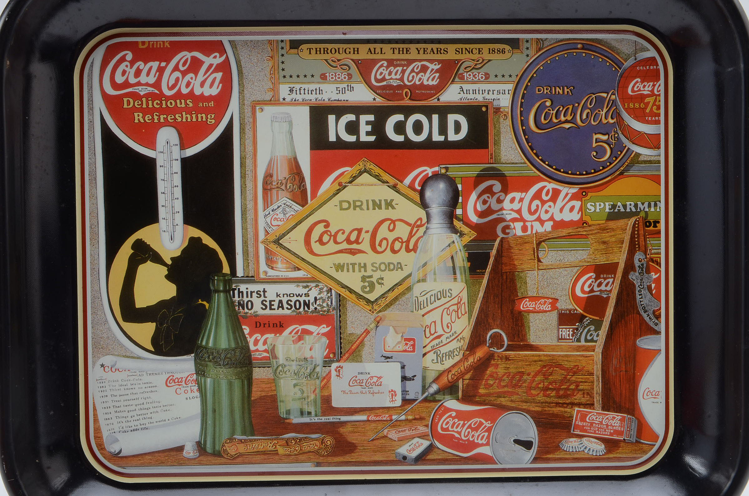 Four Coca-Cola Trays