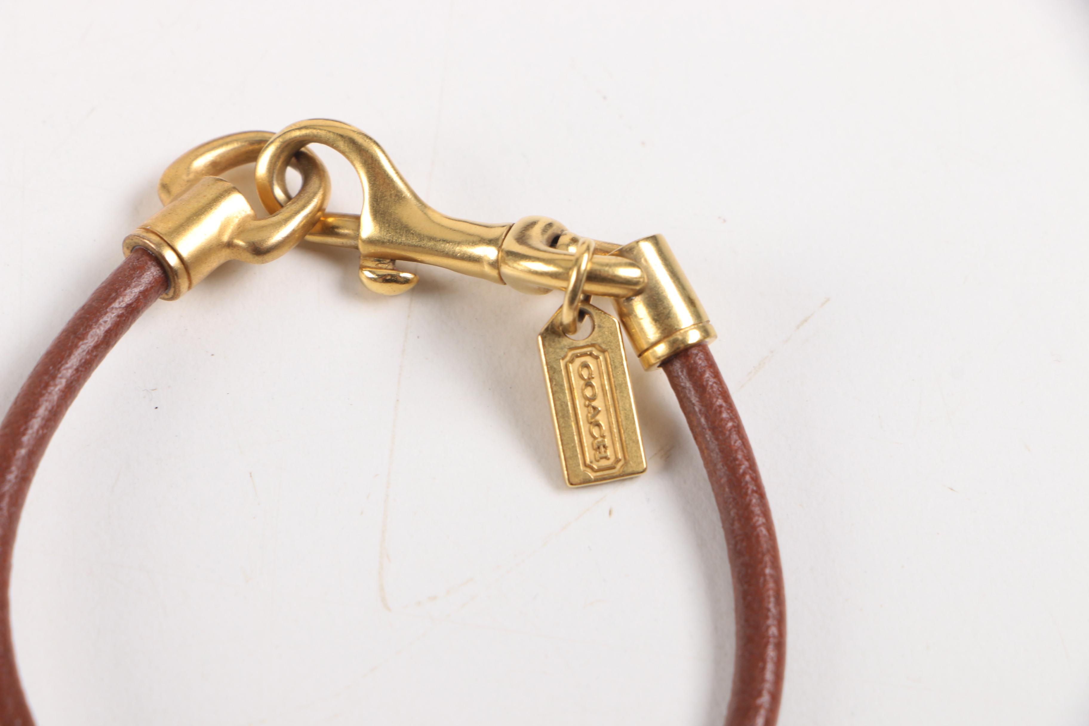 Coach Leather Cord Bracelet With Gold-Tone Peace Charm