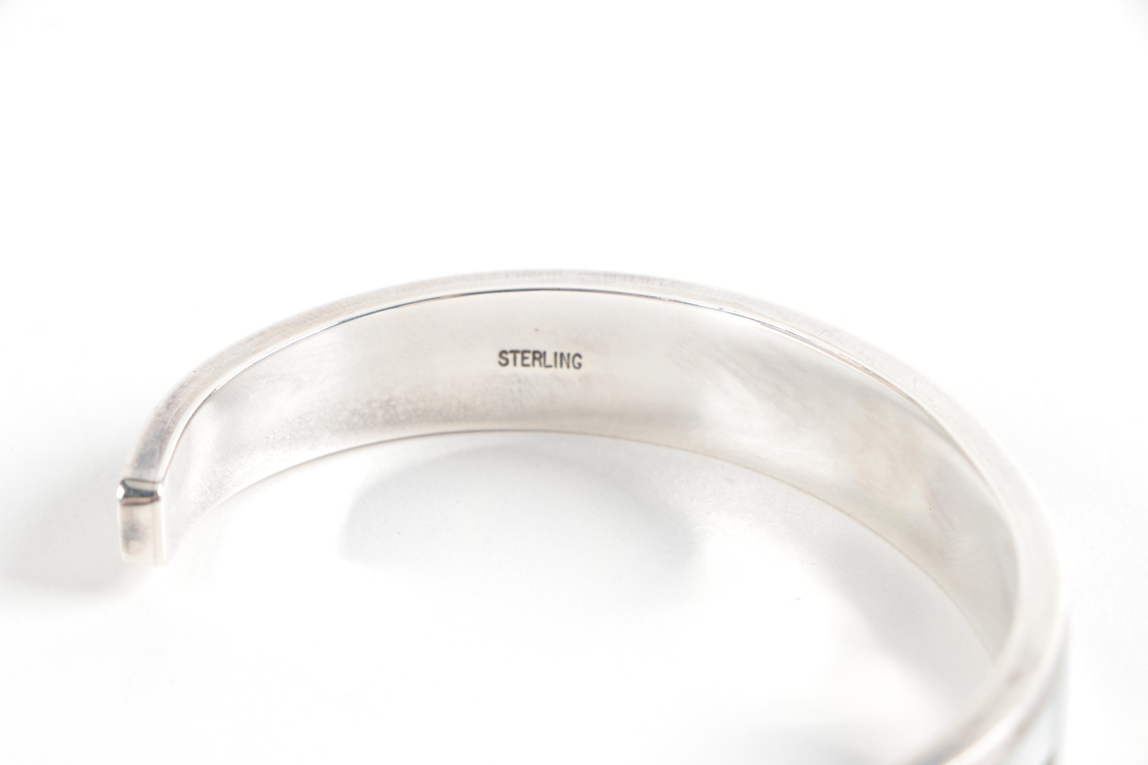 Pair of Sterling Silver Cuff Bracelets Including Native American Style Pieces