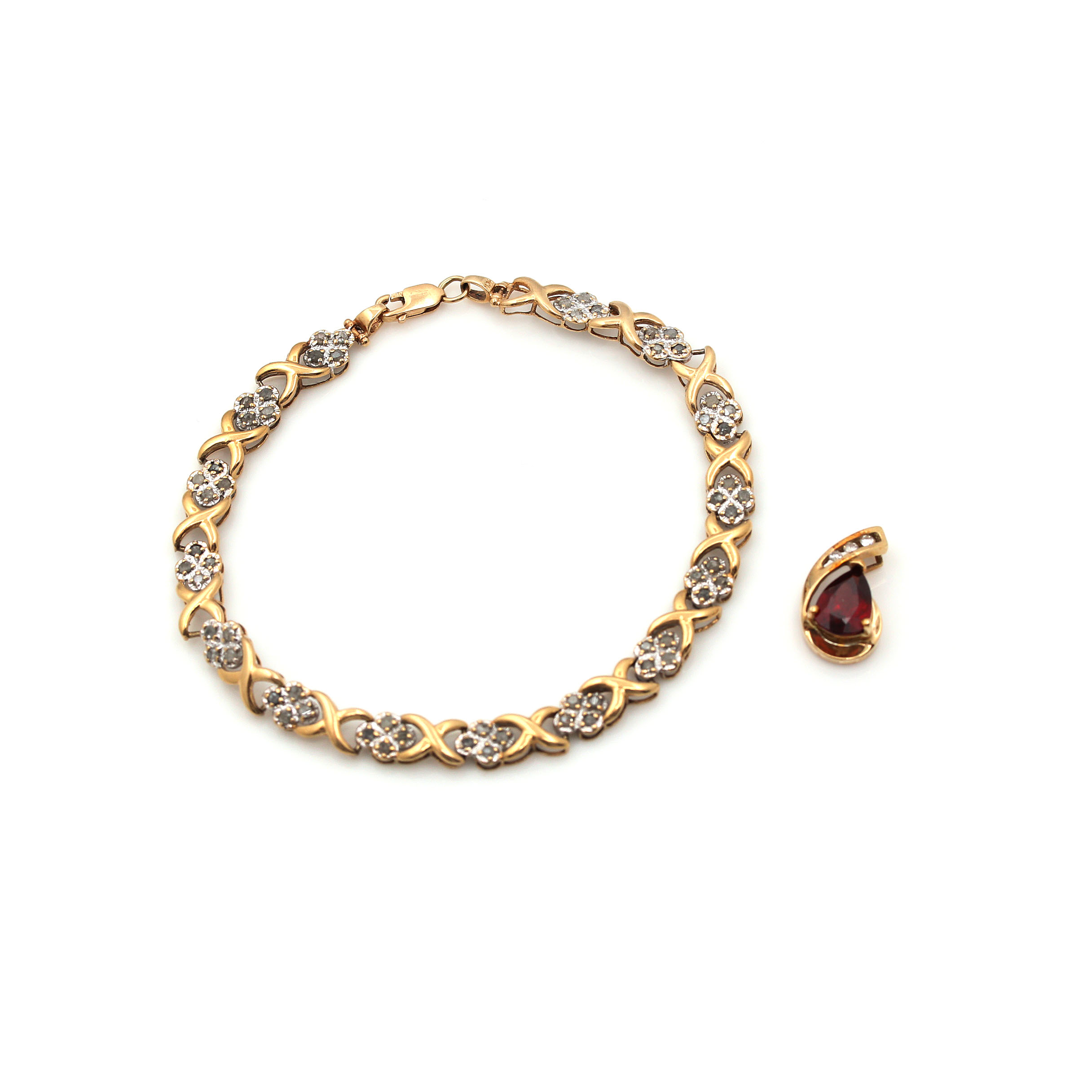 10K Yellow Gold 0.96 CTW Diamond Bracelet and Garnet Pendant