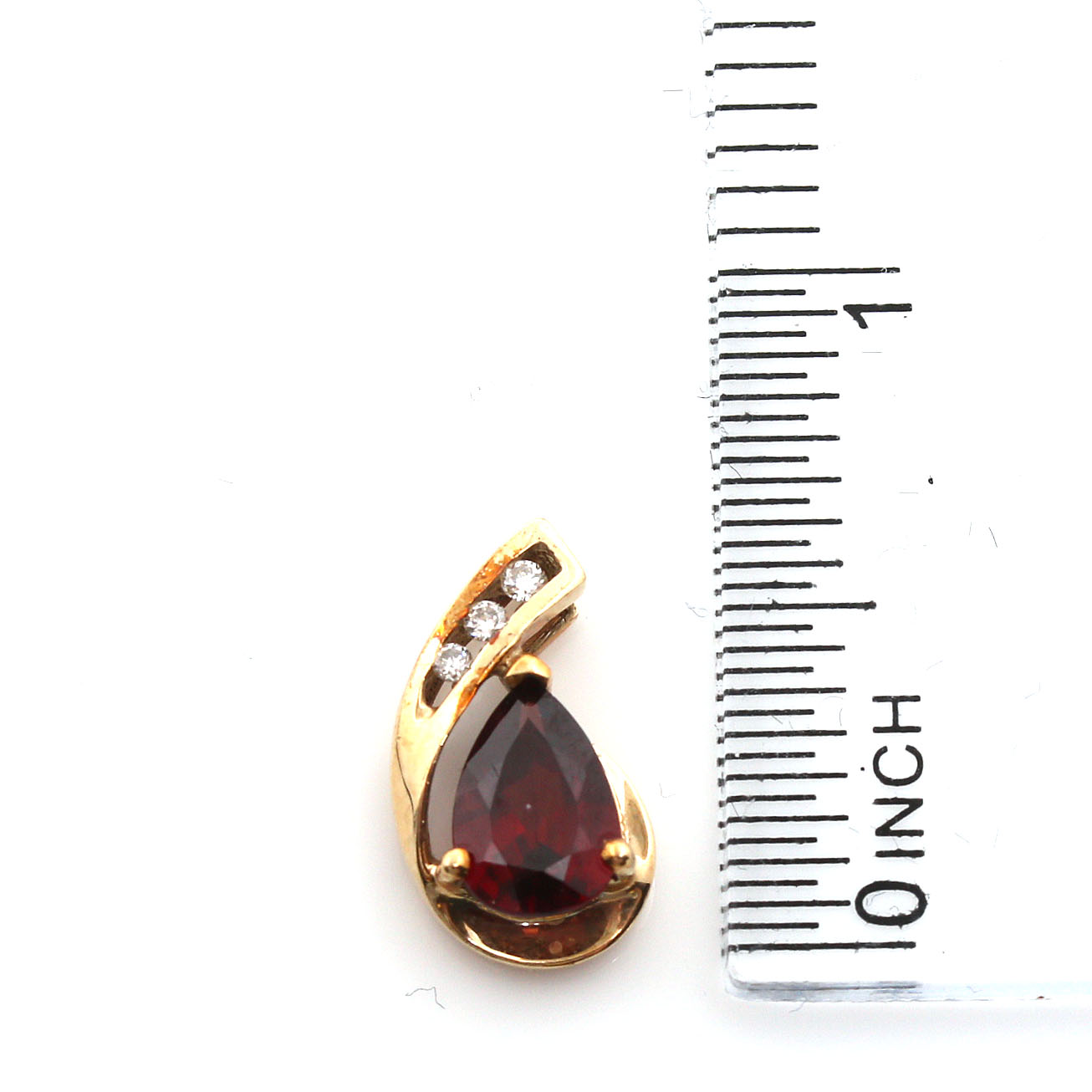 10K Yellow Gold 0.96 CTW Diamond Bracelet and Garnet Pendant