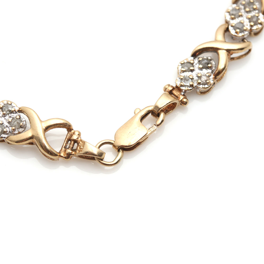 10K Yellow Gold 0.96 CTW Diamond Bracelet and Garnet Pendant