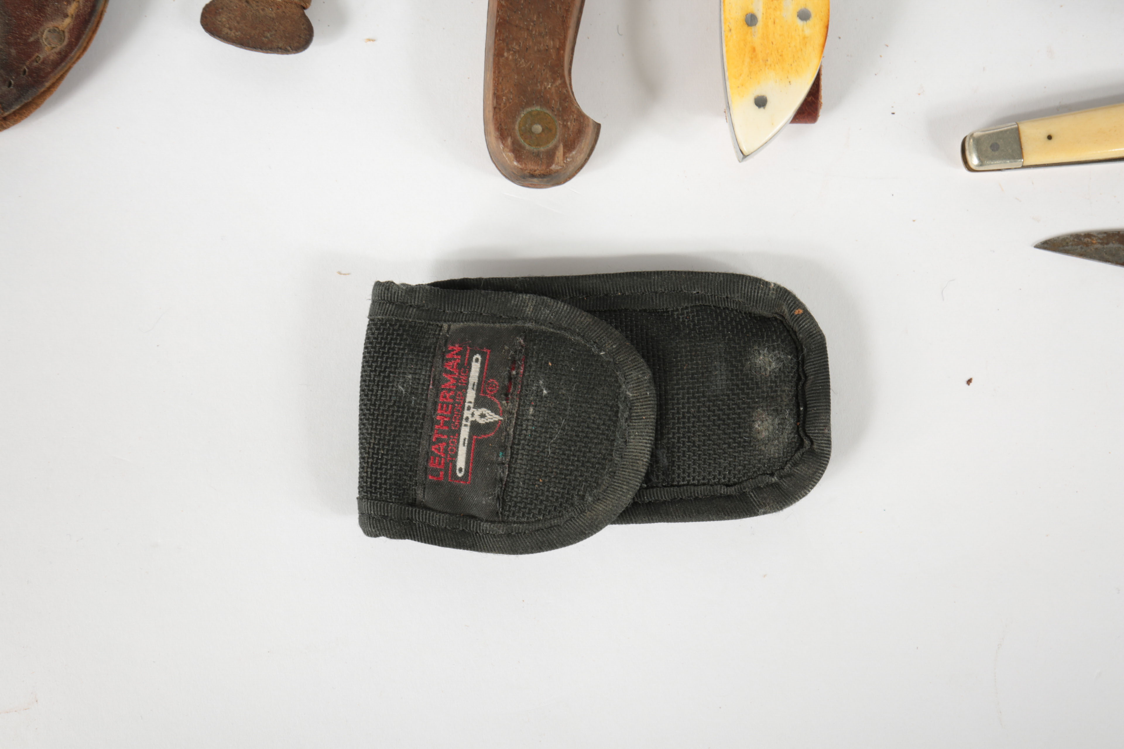 Large Collection of Fixed Blade Knives and a Folding Knife