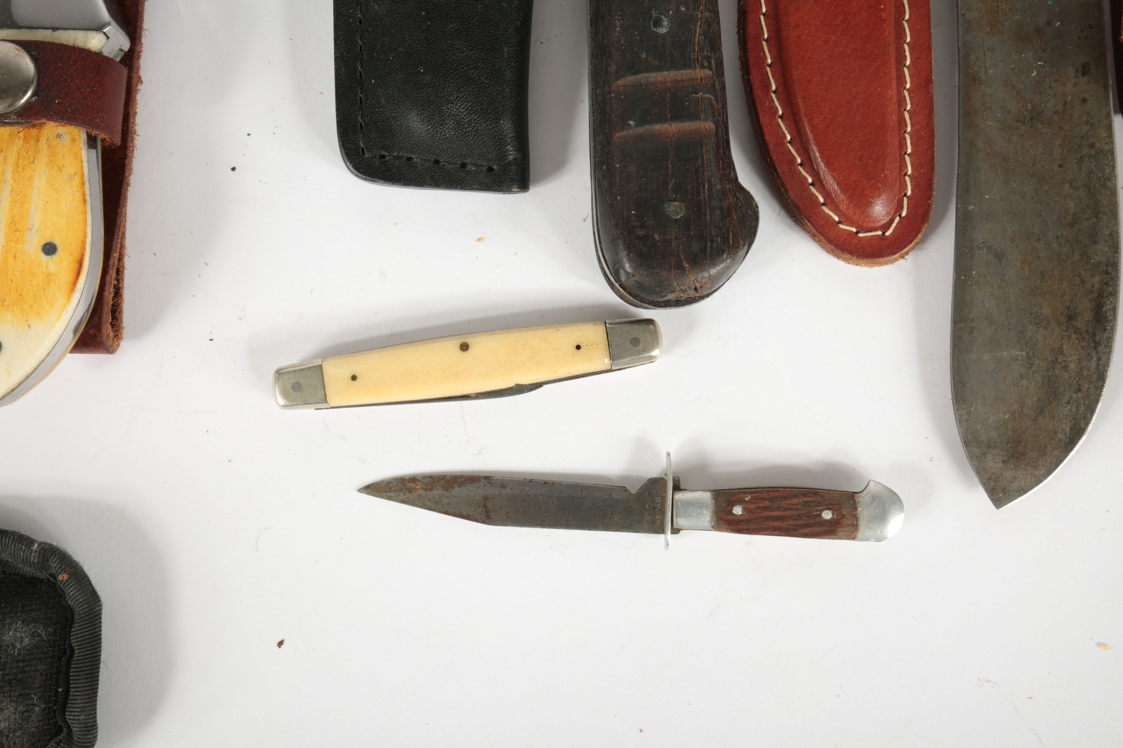 Large Collection of Fixed Blade Knives and a Folding Knife