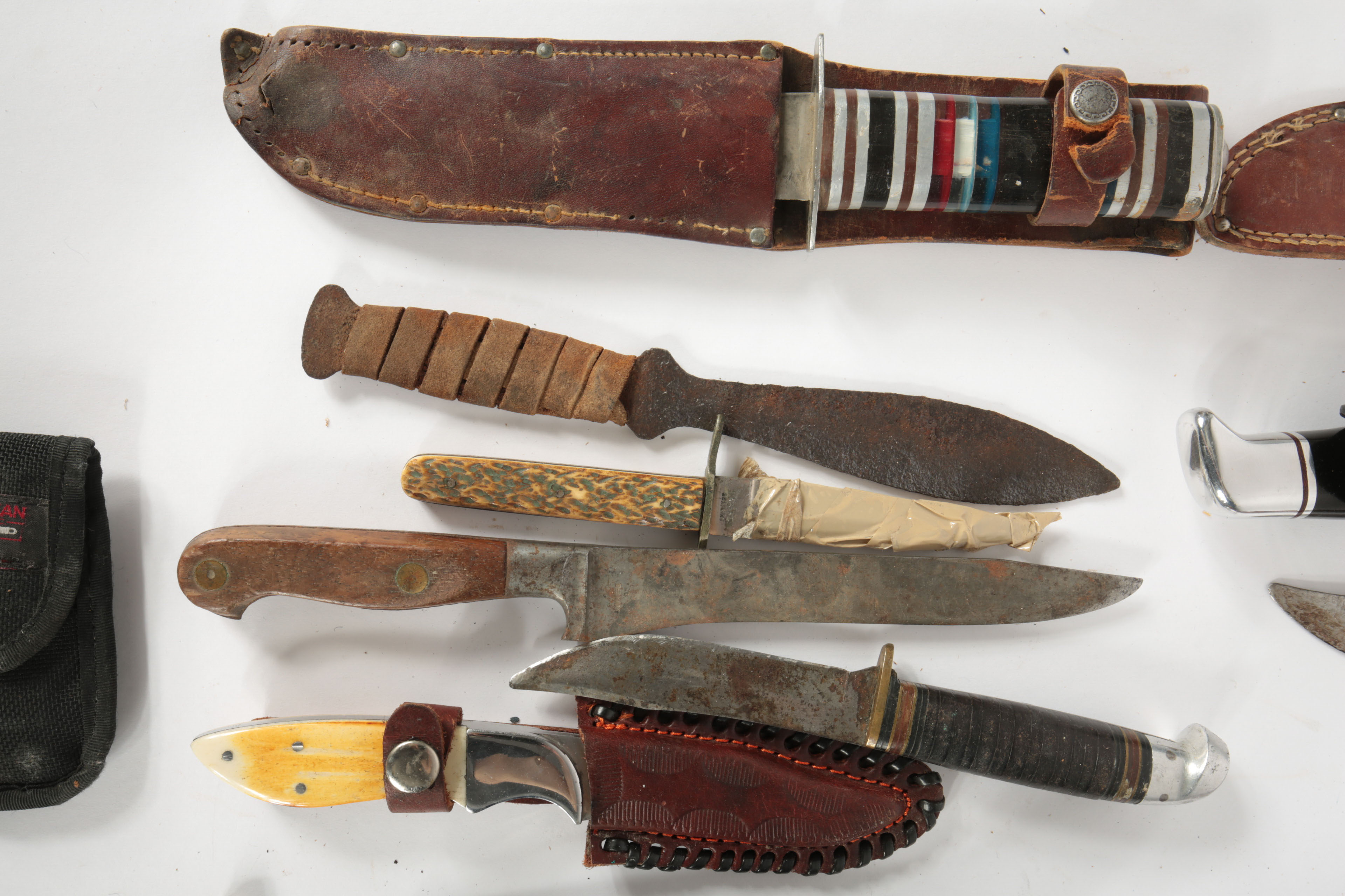 Large Collection of Fixed Blade Knives and a Folding Knife