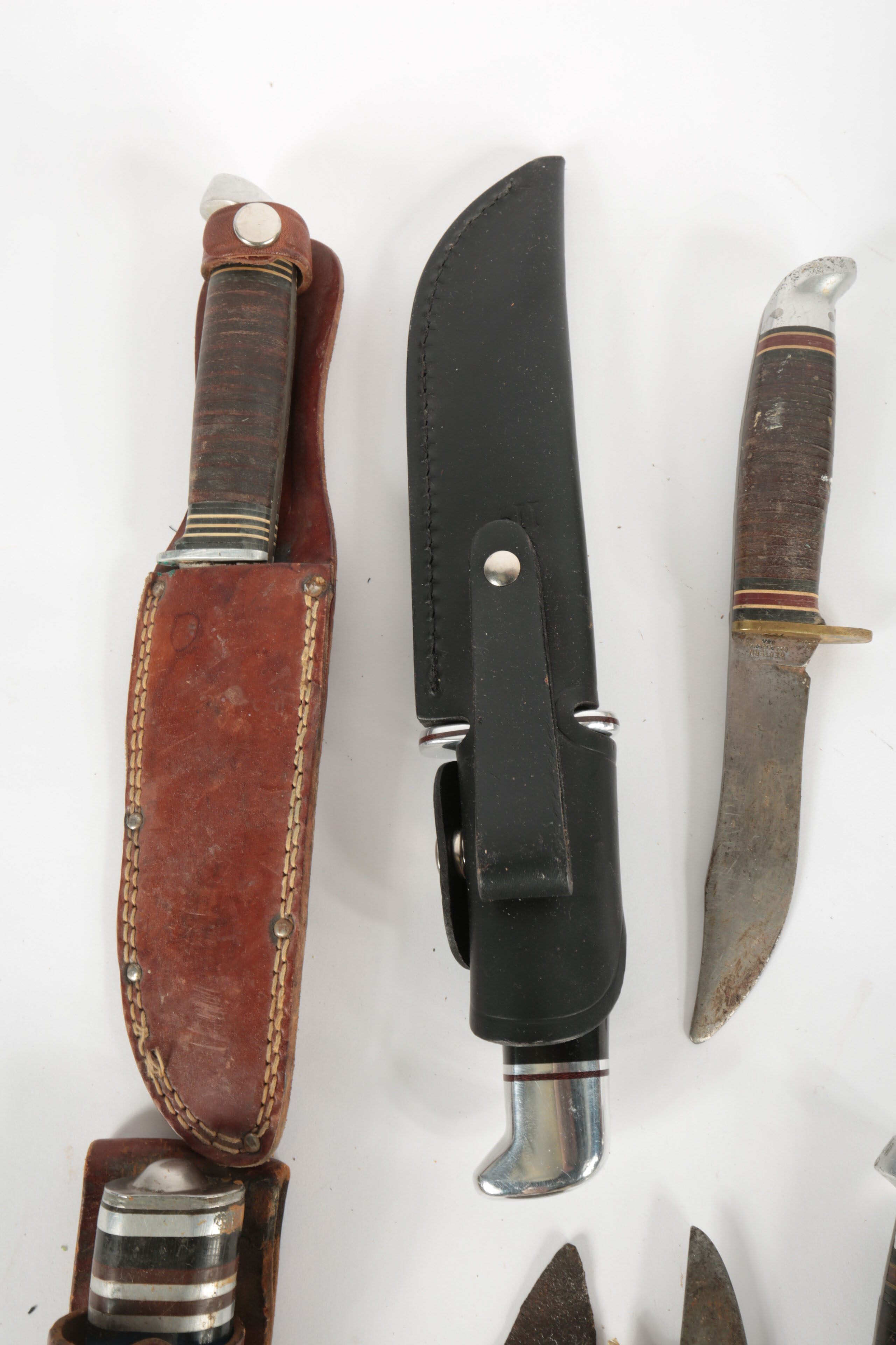 Large Collection of Fixed Blade Knives and a Folding Knife