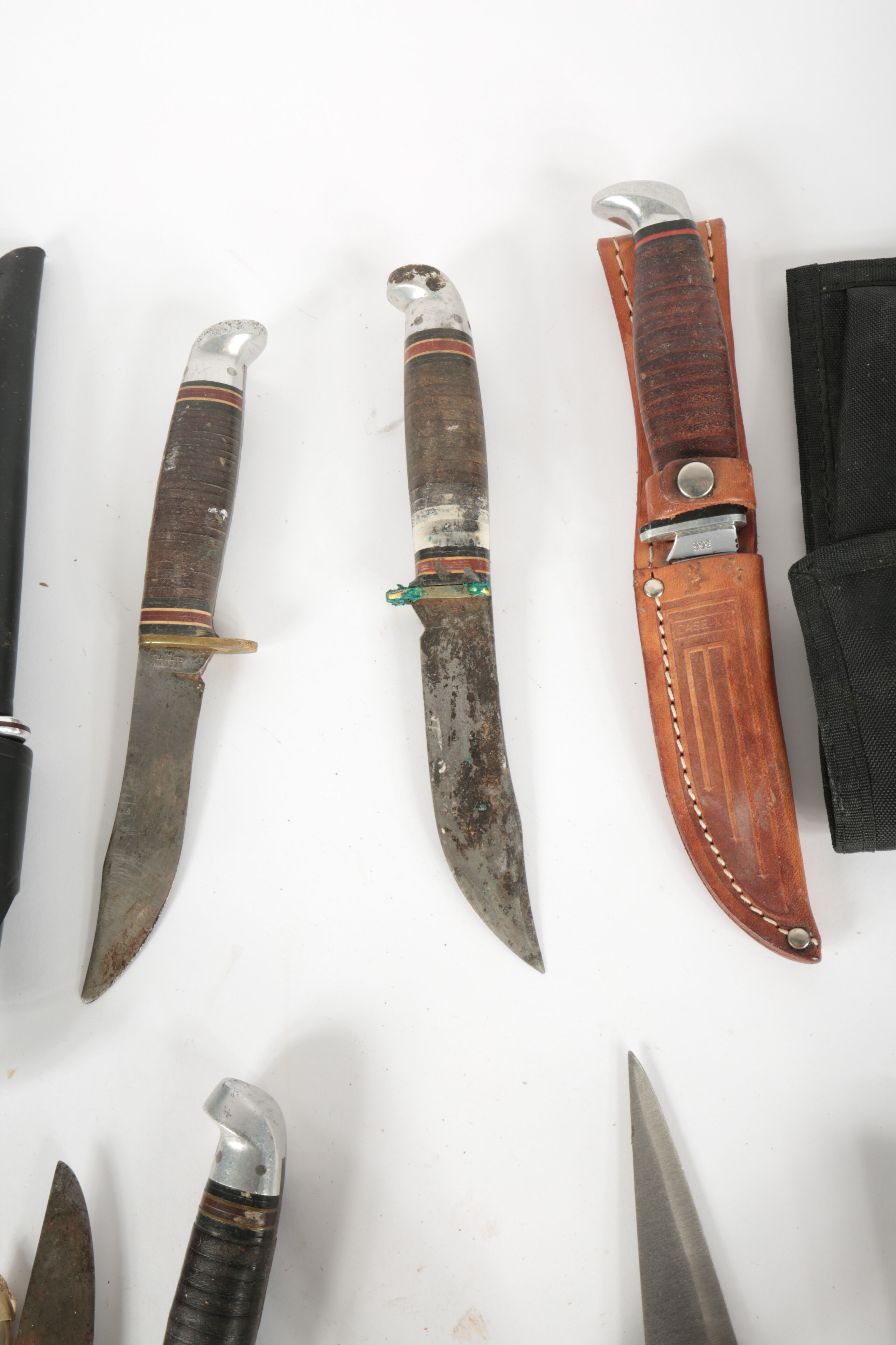 Large Collection of Fixed Blade Knives and a Folding Knife