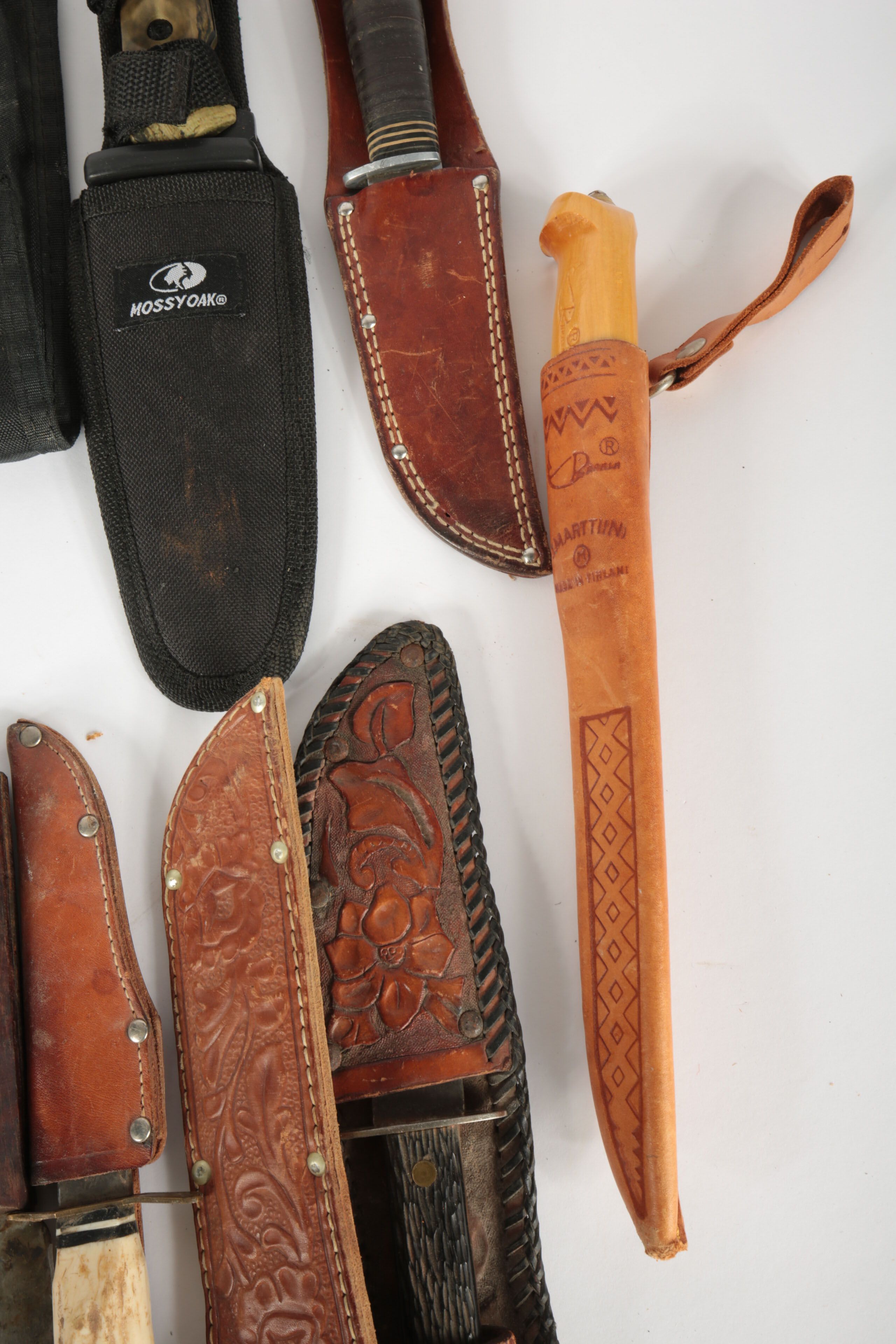 Large Collection of Fixed Blade Knives and a Folding Knife