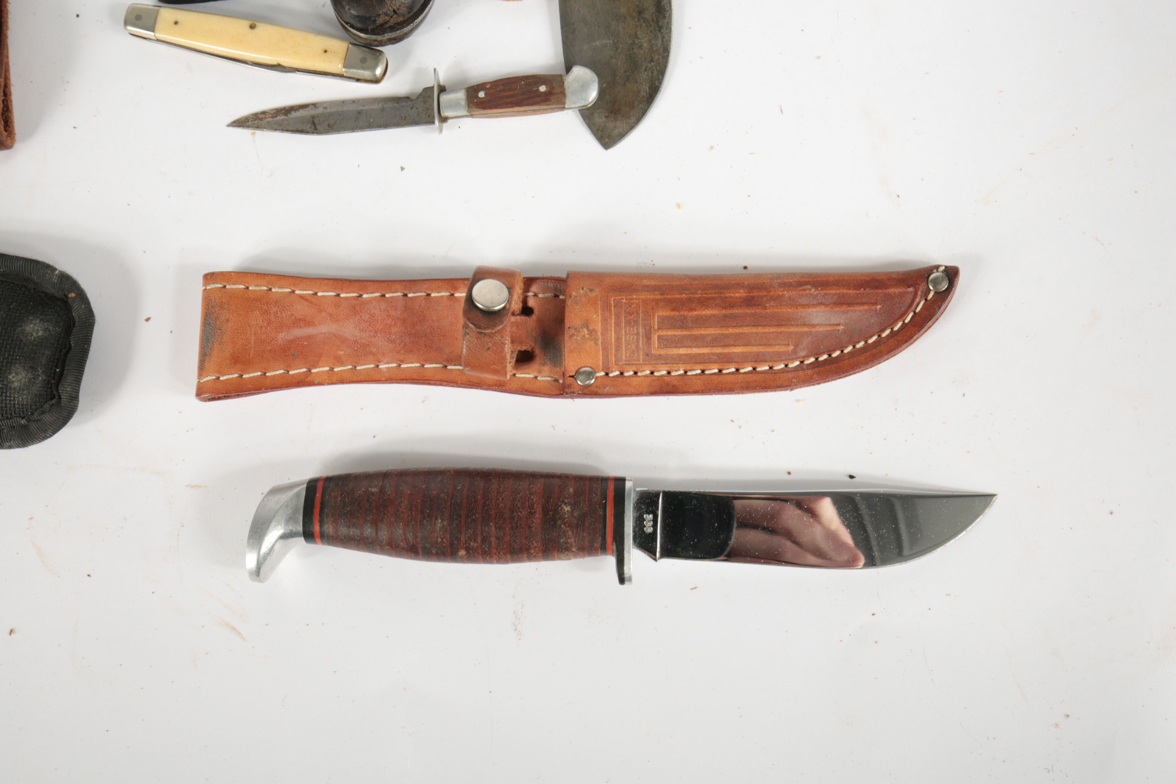 Large Collection of Fixed Blade Knives and a Folding Knife