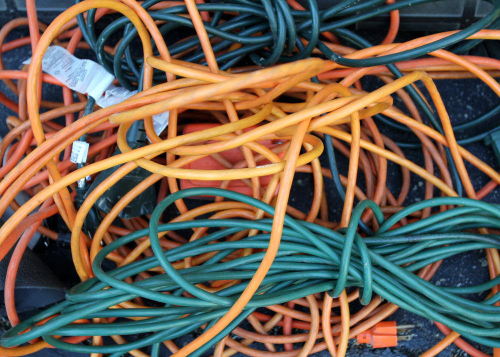 Assortment of Lawn Tools and Extension Cords