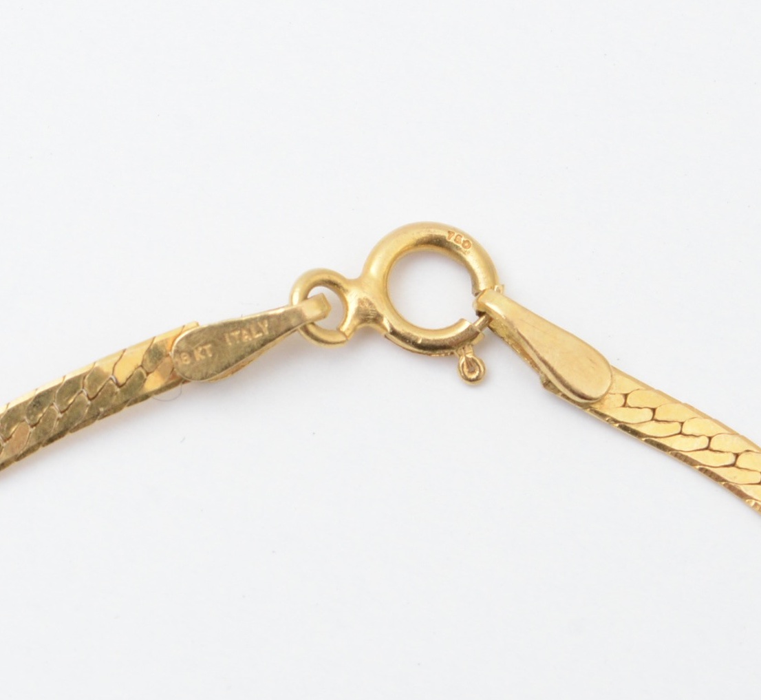 14K Gold Collection and 18K Bracelet